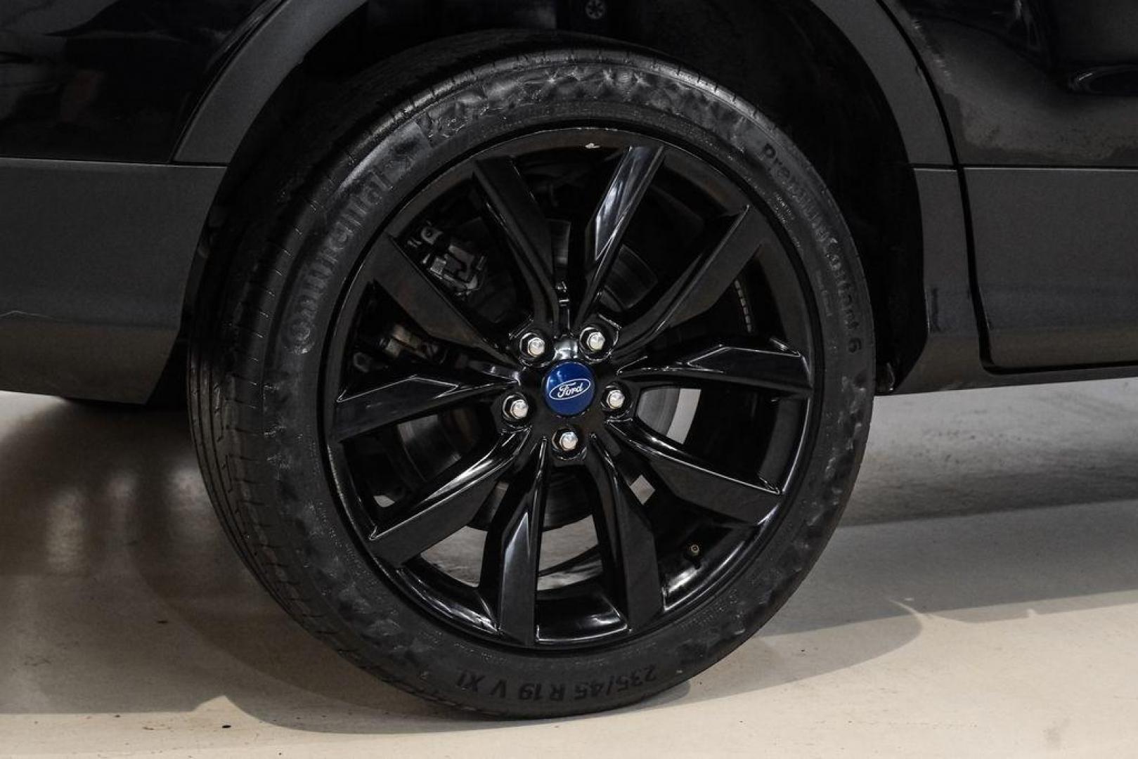 2019 Black /Medium Light Stone Ford Escape SE (1FMCU0GD2KU) with an 1.5L EcoBoost engine, Automatic transmission, located at 15300 Midway Rd., Addison, TX, 75001, (972) 702-0011, 32.958321, -96.838074 - Photo#57