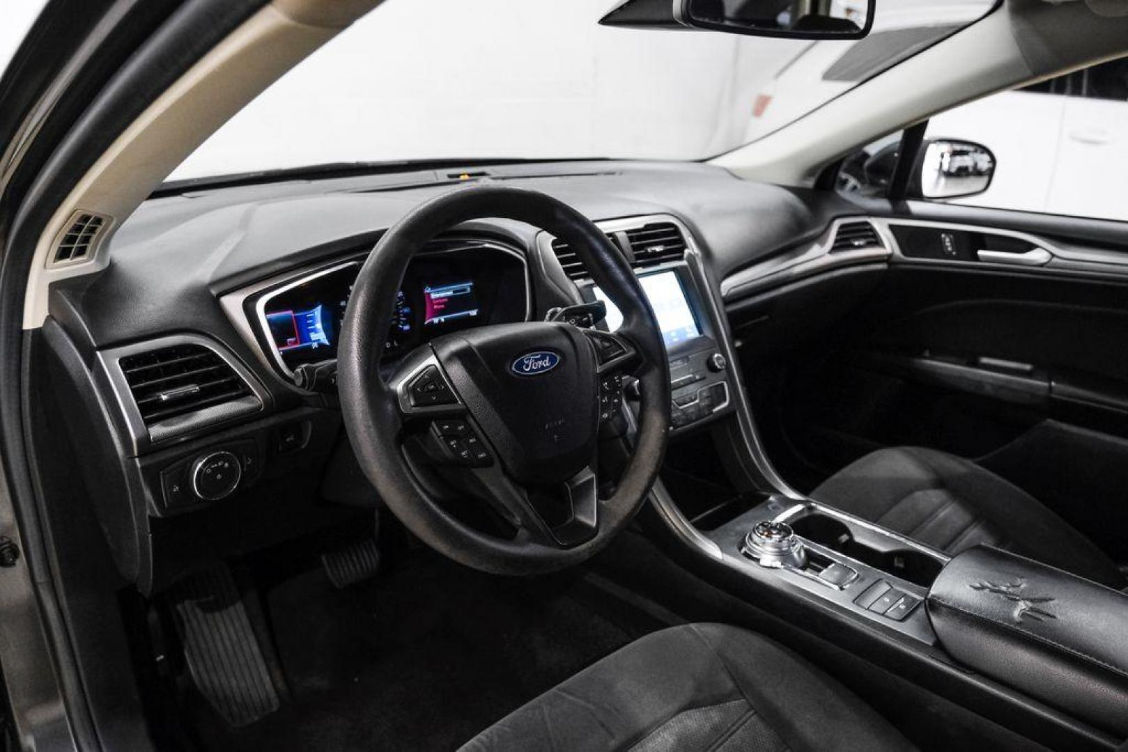 2020 Magnetic /Ebony Ford Fusion SE (3FA6P0HD5LR) with an 1.5L EcoBoost engine, Automatic transmission, located at 15300 Midway Rd., Addison, TX, 75001, (972) 702-0011, 32.958321, -96.838074 - Photo#2