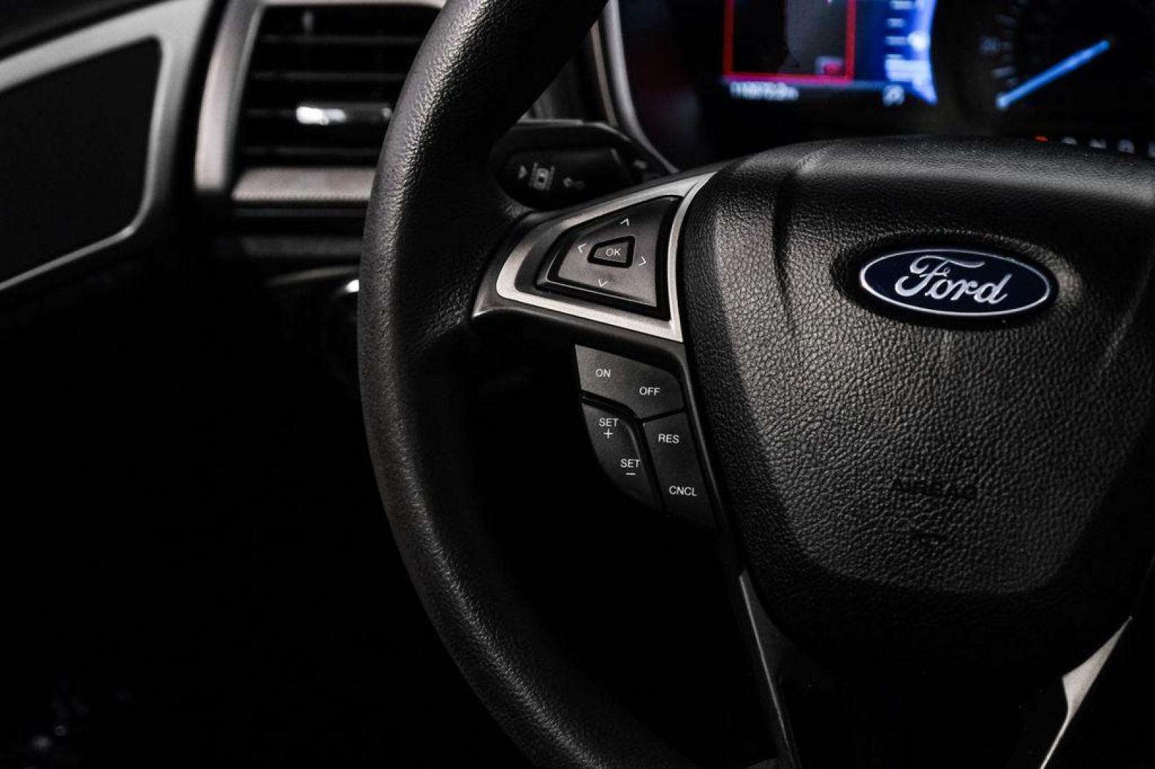 2020 Magnetic /Ebony Ford Fusion SE (3FA6P0HD5LR) with an 1.5L EcoBoost engine, Automatic transmission, located at 15300 Midway Rd., Addison, TX, 75001, (972) 702-0011, 32.958321, -96.838074 - Photo#15