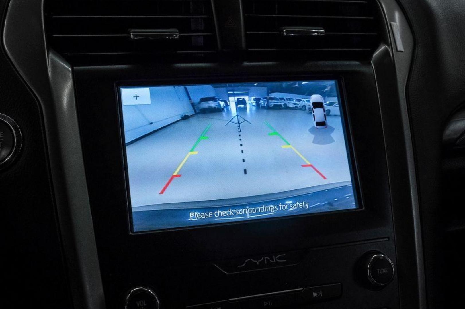 2020 Magnetic /Ebony Ford Fusion SE (3FA6P0HD5LR) with an 1.5L EcoBoost engine, Automatic transmission, located at 15300 Midway Rd., Addison, TX, 75001, (972) 702-0011, 32.958321, -96.838074 - Photo#21