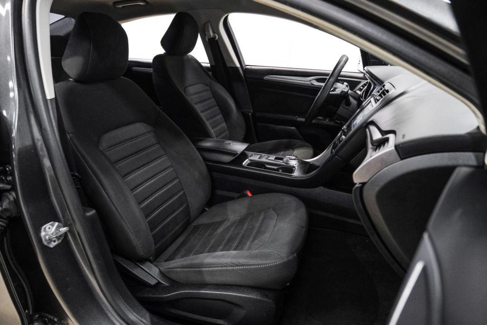 2020 Magnetic /Ebony Ford Fusion SE (3FA6P0HD5LR) with an 1.5L EcoBoost engine, Automatic transmission, located at 15300 Midway Rd., Addison, TX, 75001, (972) 702-0011, 32.958321, -96.838074 - Photo#29