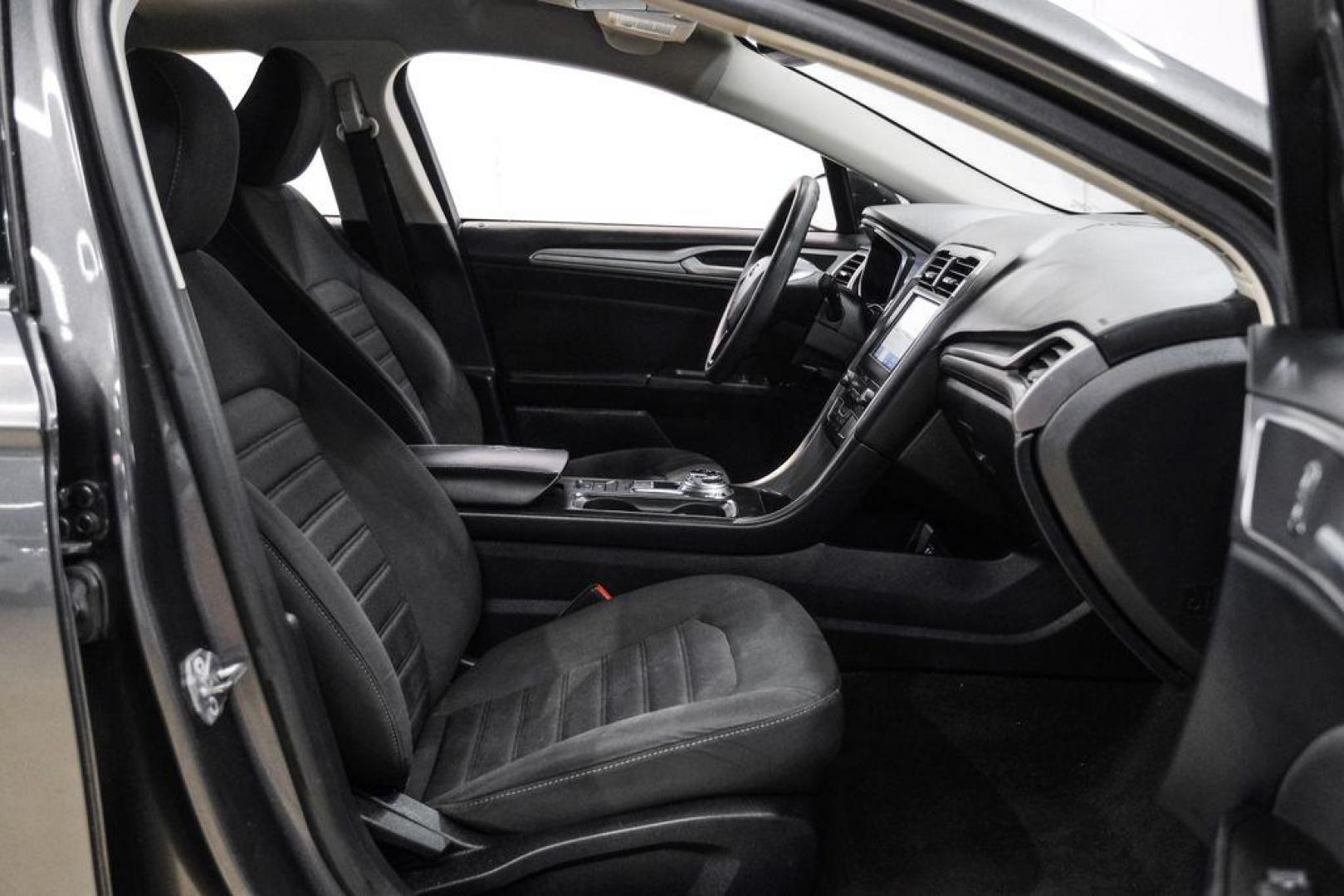 2020 Magnetic /Ebony Ford Fusion SE (3FA6P0HD5LR) with an 1.5L EcoBoost engine, Automatic transmission, located at 15300 Midway Rd., Addison, TX, 75001, (972) 702-0011, 32.958321, -96.838074 - Photo#30