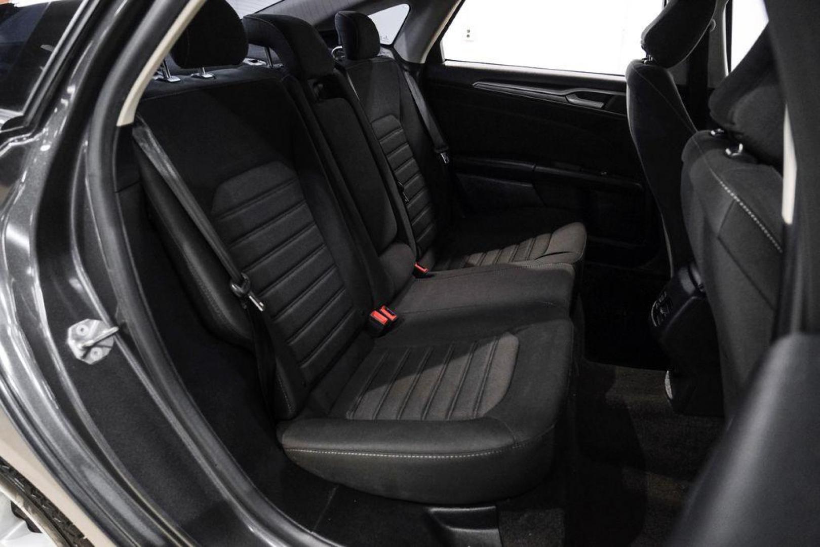 2020 Magnetic /Ebony Ford Fusion SE (3FA6P0HD5LR) with an 1.5L EcoBoost engine, Automatic transmission, located at 15300 Midway Rd., Addison, TX, 75001, (972) 702-0011, 32.958321, -96.838074 - Photo#31