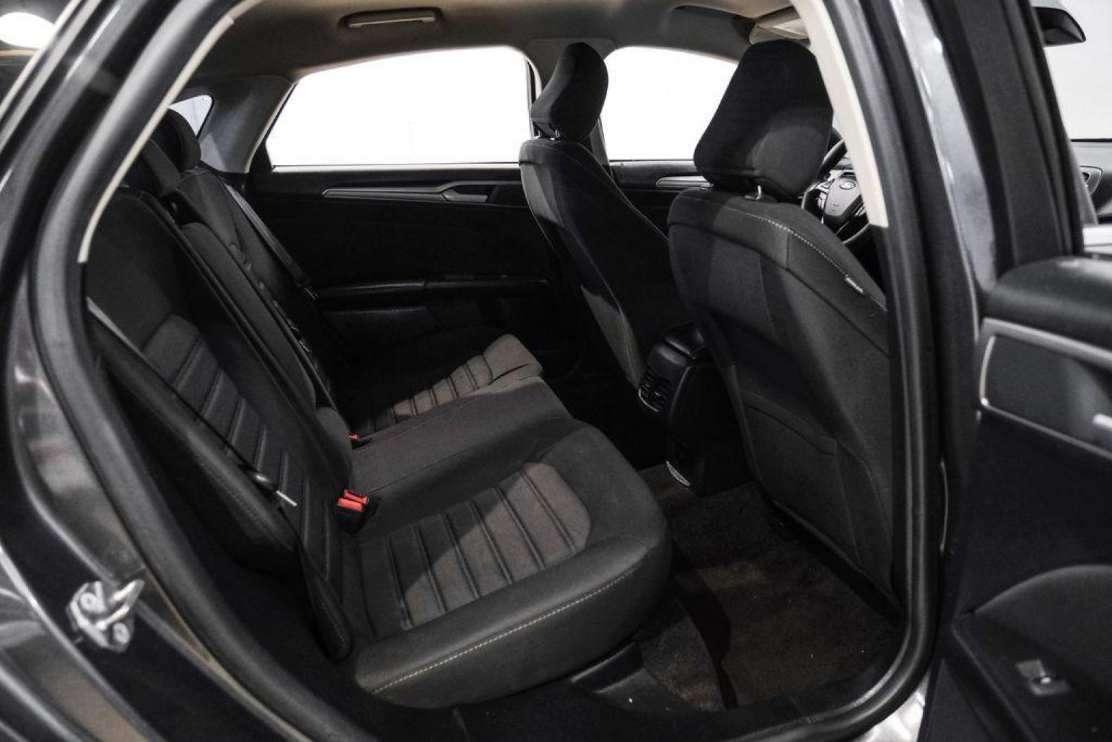 2020 Magnetic /Ebony Ford Fusion SE (3FA6P0HD5LR) with an 1.5L EcoBoost engine, Automatic transmission, located at 15300 Midway Rd., Addison, TX, 75001, (972) 702-0011, 32.958321, -96.838074 - Photo#32