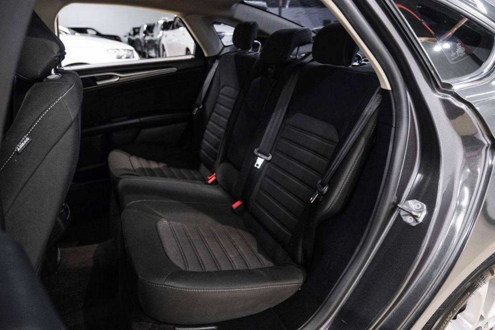 2020 Magnetic /Ebony Ford Fusion SE (3FA6P0HD5LR) with an 1.5L EcoBoost engine, Automatic transmission, located at 15300 Midway Rd., Addison, TX, 75001, (972) 702-0011, 32.958321, -96.838074 - Photo#34