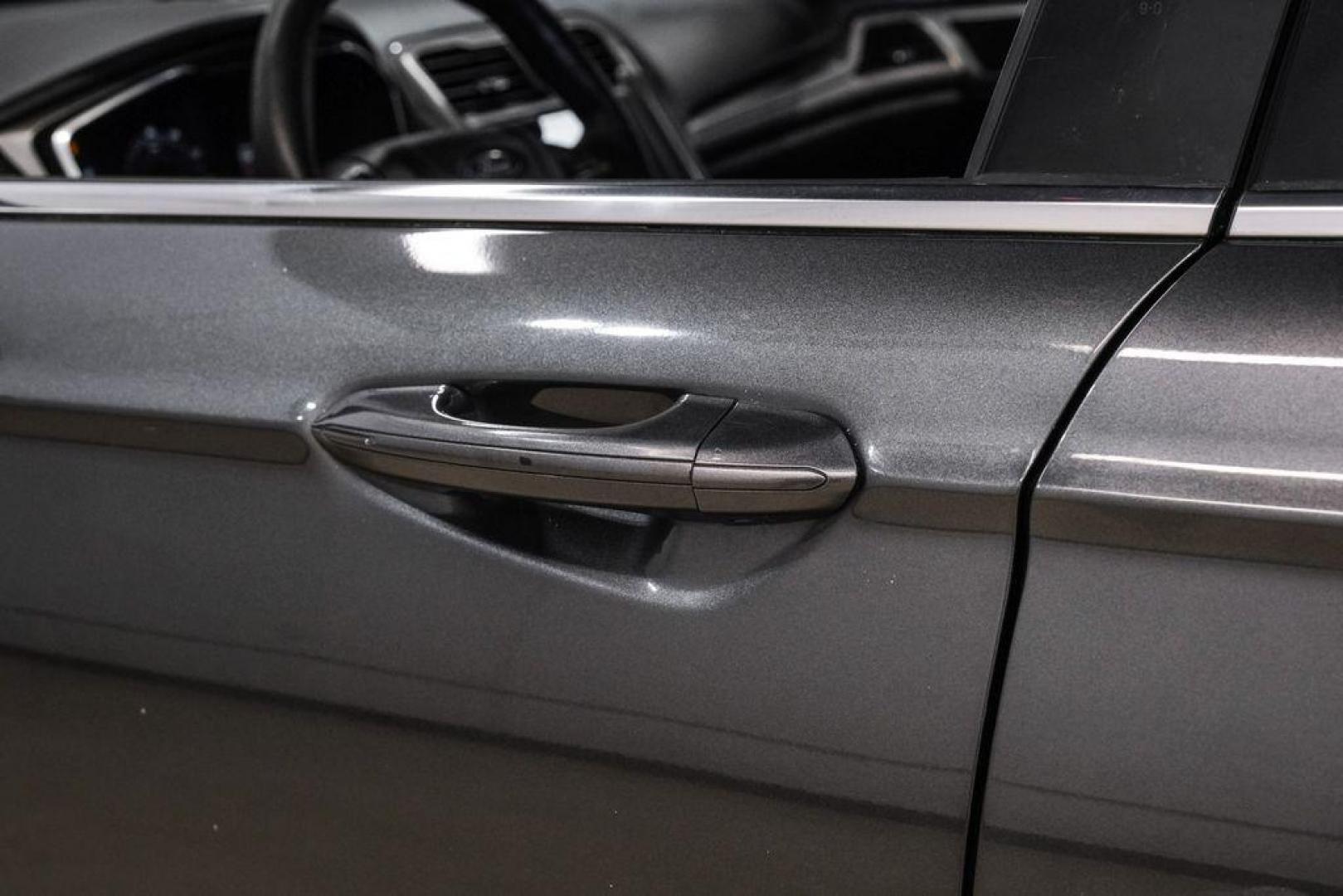 2020 Magnetic /Ebony Ford Fusion SE (3FA6P0HD5LR) with an 1.5L EcoBoost engine, Automatic transmission, located at 15300 Midway Rd., Addison, TX, 75001, (972) 702-0011, 32.958321, -96.838074 - Photo#35