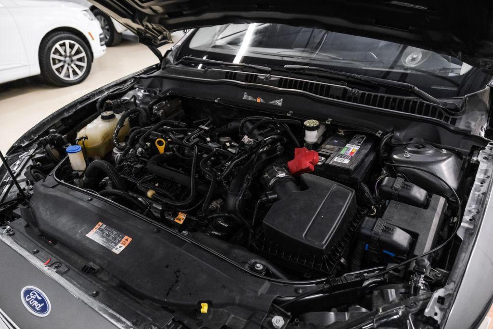 2020 Magnetic /Ebony Ford Fusion SE (3FA6P0HD5LR) with an 1.5L EcoBoost engine, Automatic transmission, located at 15300 Midway Rd., Addison, TX, 75001, (972) 702-0011, 32.958321, -96.838074 - Photo#44