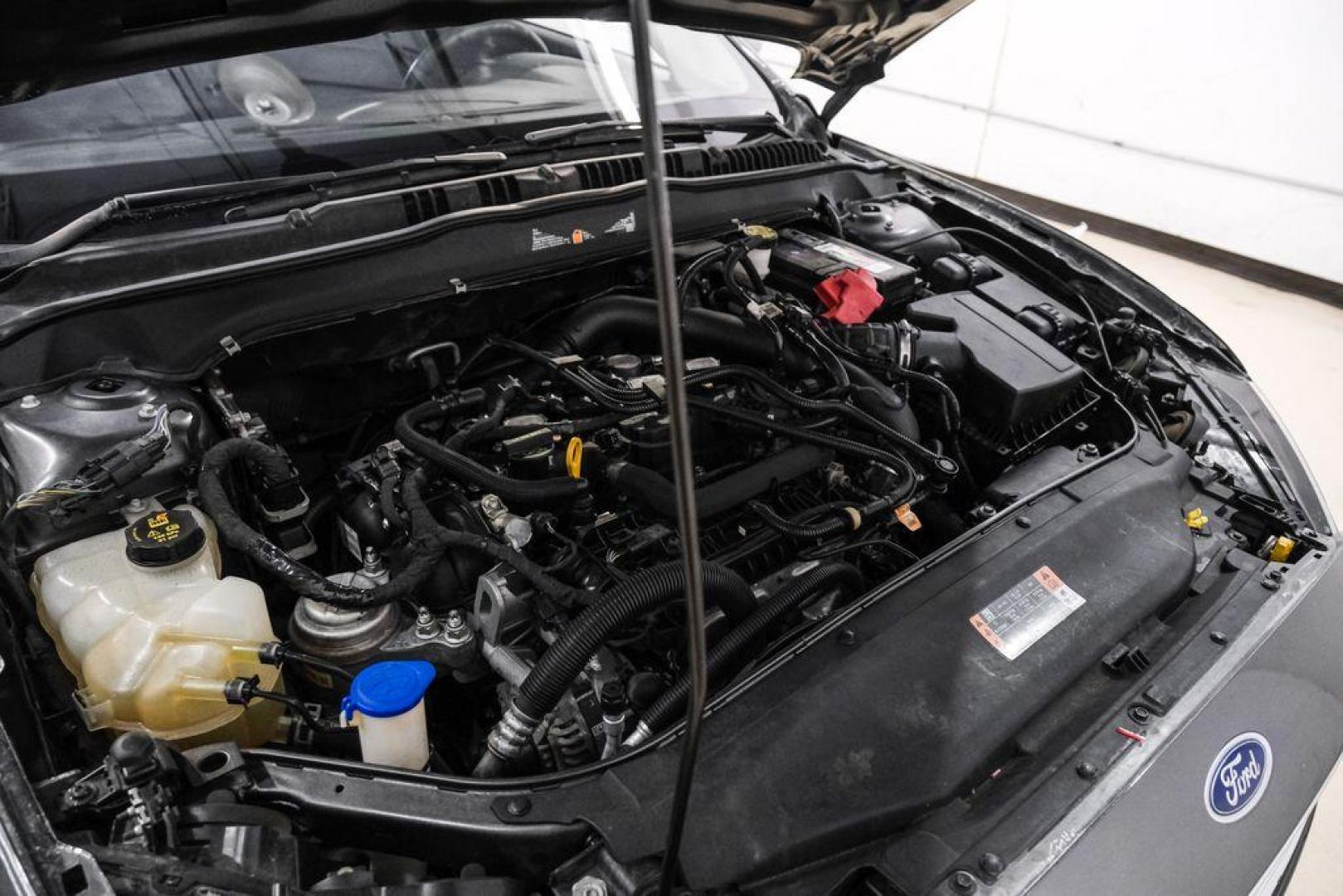 2020 Magnetic /Ebony Ford Fusion SE (3FA6P0HD5LR) with an 1.5L EcoBoost engine, Automatic transmission, located at 15300 Midway Rd., Addison, TX, 75001, (972) 702-0011, 32.958321, -96.838074 - Photo#46