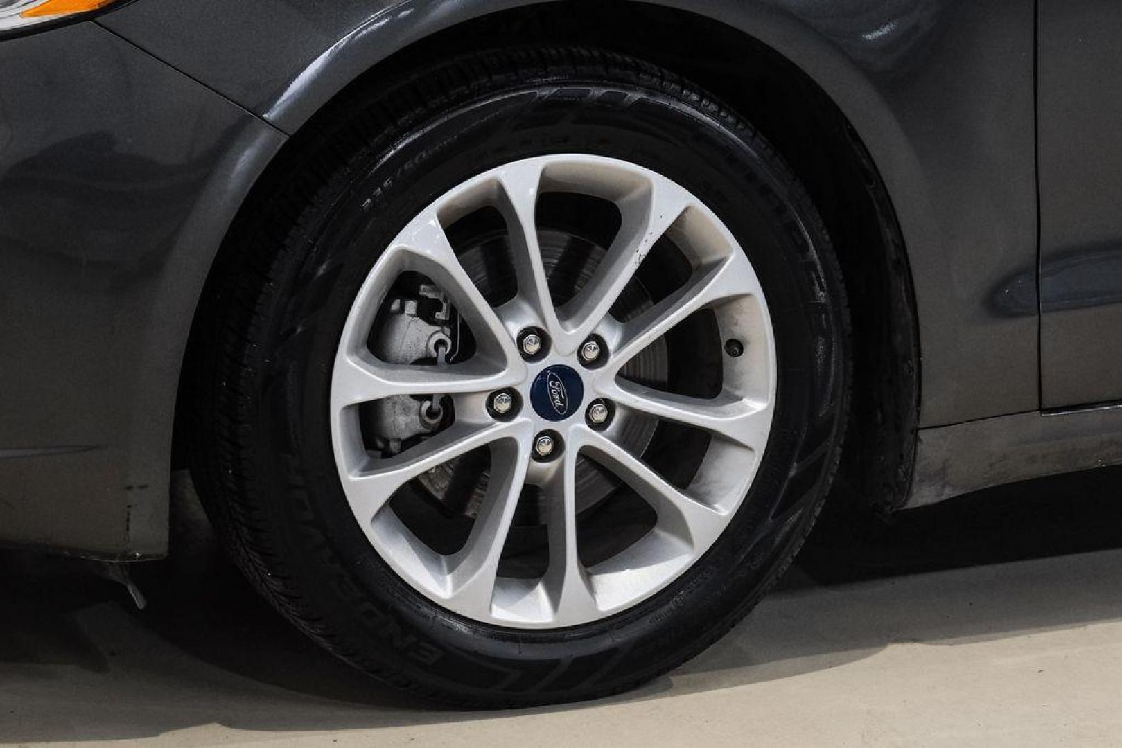 2020 Magnetic /Ebony Ford Fusion SE (3FA6P0HD5LR) with an 1.5L EcoBoost engine, Automatic transmission, located at 15300 Midway Rd., Addison, TX, 75001, (972) 702-0011, 32.958321, -96.838074 - Photo#49