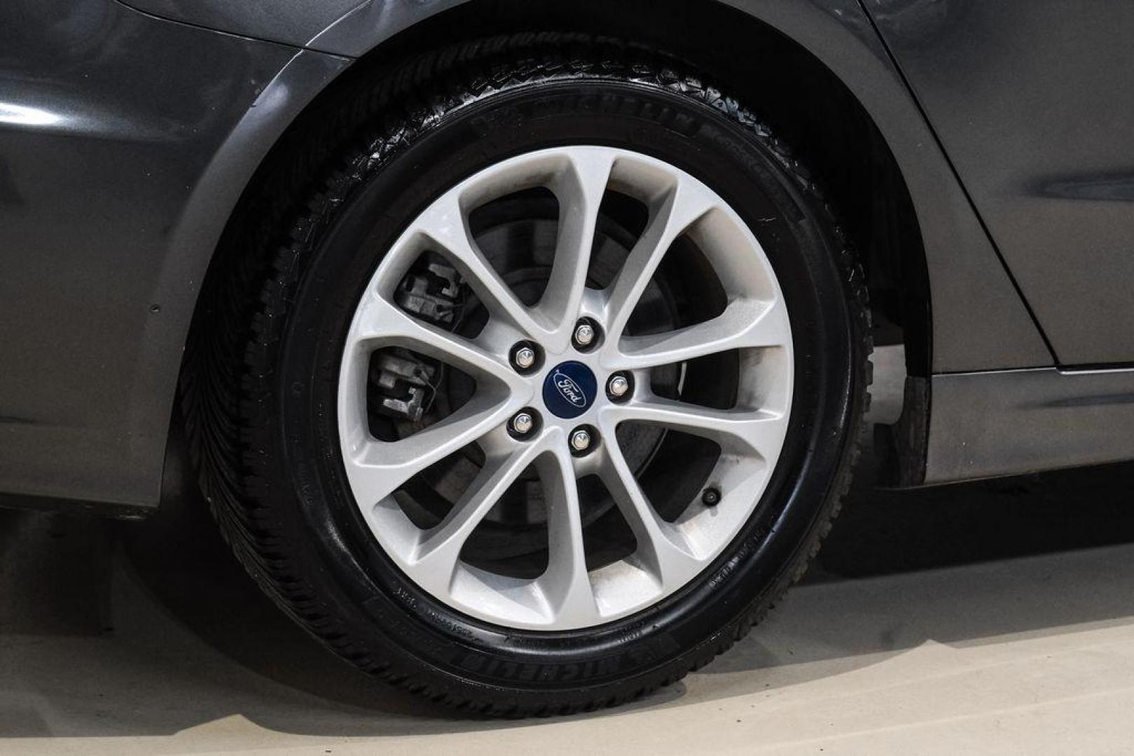 2020 Magnetic /Ebony Ford Fusion SE (3FA6P0HD5LR) with an 1.5L EcoBoost engine, Automatic transmission, located at 15300 Midway Rd., Addison, TX, 75001, (972) 702-0011, 32.958321, -96.838074 - Photo#51