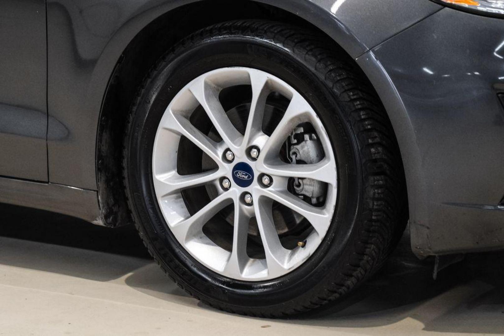 2020 Magnetic /Ebony Ford Fusion SE (3FA6P0HD5LR) with an 1.5L EcoBoost engine, Automatic transmission, located at 15300 Midway Rd., Addison, TX, 75001, (972) 702-0011, 32.958321, -96.838074 - Photo#52