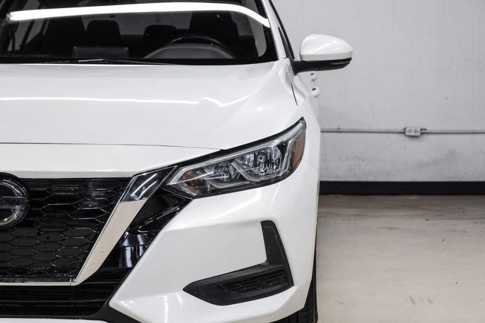 2020 Aspen White Tricoat /Charcoal Nissan Sentra SV (3N1AB8CVXLY) with an 2.0L DOHC engine, CVT transmission, located at 15300 Midway Rd., Addison, TX, 75001, (972) 702-0011, 32.958321, -96.838074 - Photo#44