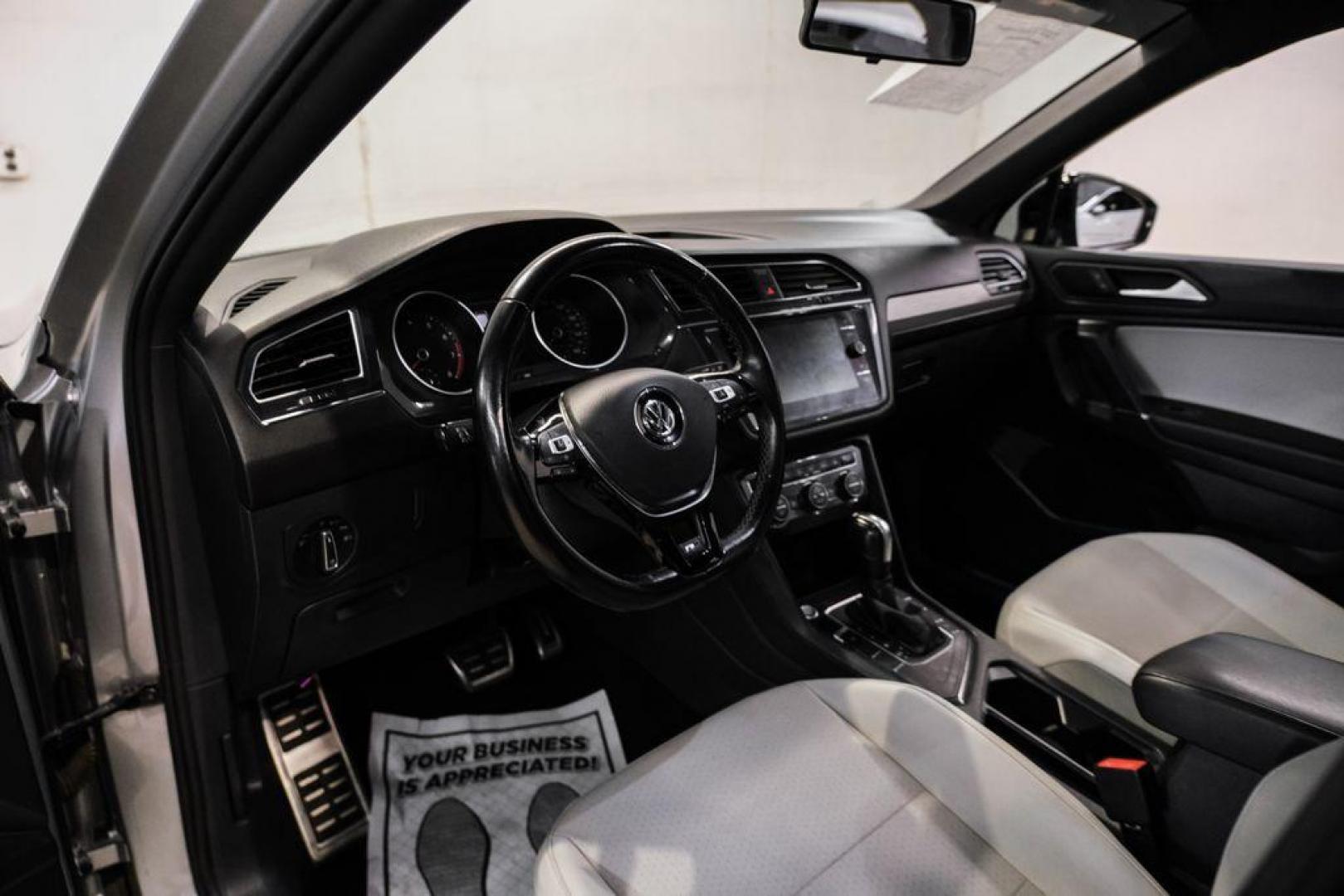 2020 Silver Metallic /Storm Gray Volkswagen Tiguan 2.0T SE R-Line Black (3VV3B7AX3LM) with an 2.0L TSI DOHC engine, Automatic transmission, located at 15300 Midway Rd., Addison, TX, 75001, (972) 702-0011, 32.958321, -96.838074 - Photo#2