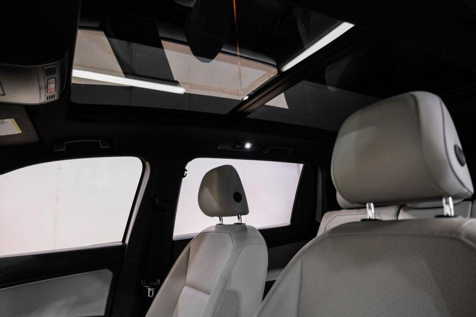 2020 Silver Metallic /Storm Gray Volkswagen Tiguan 2.0T SE R-Line Black (3VV3B7AX3LM) with an 2.0L TSI DOHC engine, Automatic transmission, located at 15300 Midway Rd., Addison, TX, 75001, (972) 702-0011, 32.958321, -96.838074 - Photo#4