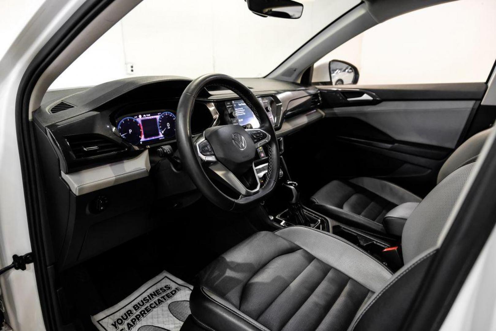 2022 Pure White /Gray/Black Volkswagen Taos 1.5T SEL (3VV1X7B28NM) with an 1.5L I4 Turbocharged DOHC 16V LEV3-SULEV30 158hp engine, Automatic transmission, located at 15300 Midway Rd., Addison, TX, 75001, (972) 702-0011, 32.958321, -96.838074 - Photo#2