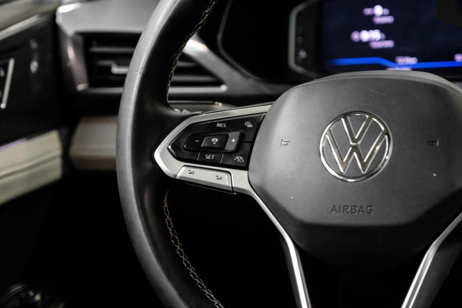 2022 Pure White /Gray/Black Volkswagen Taos 1.5T SEL (3VV1X7B28NM) with an 1.5L I4 Turbocharged DOHC 16V LEV3-SULEV30 158hp engine, Automatic transmission, located at 15300 Midway Rd., Addison, TX, 75001, (972) 702-0011, 32.958321, -96.838074 - Photo#18