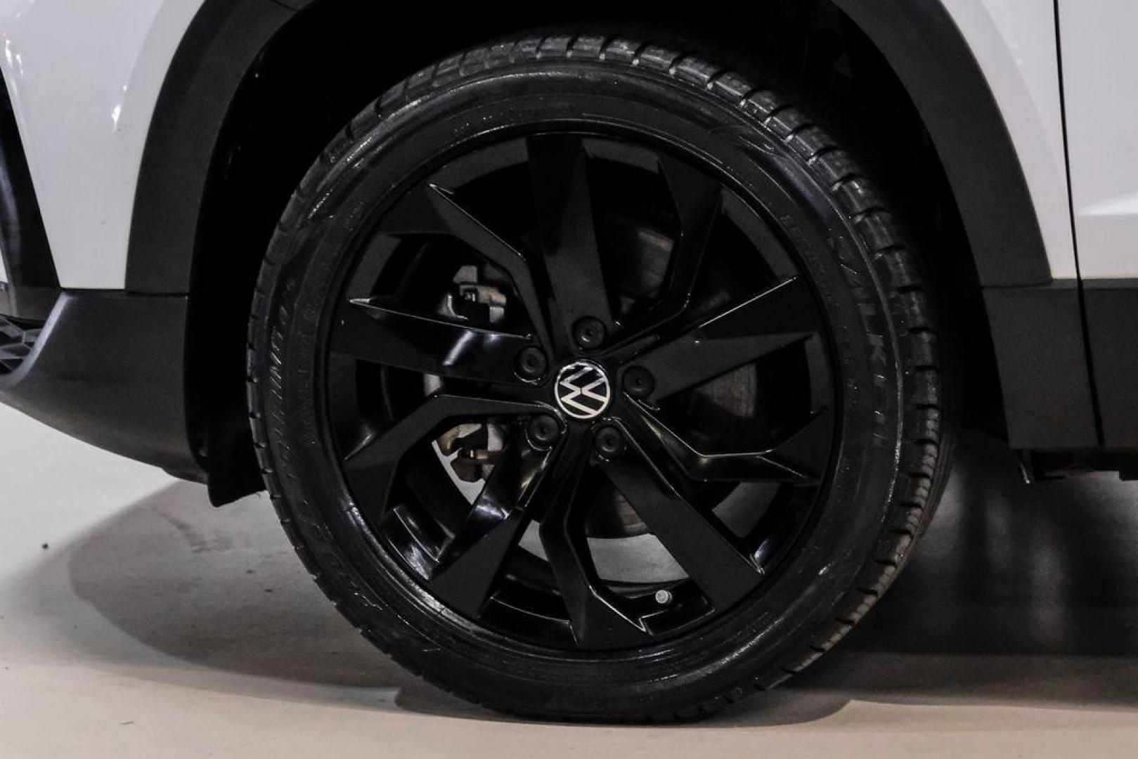 2022 Pure White /Gray/Black Volkswagen Taos 1.5T SEL (3VV1X7B28NM) with an 1.5L I4 Turbocharged DOHC 16V LEV3-SULEV30 158hp engine, Automatic transmission, located at 15300 Midway Rd., Addison, TX, 75001, (972) 702-0011, 32.958321, -96.838074 - Photo#55