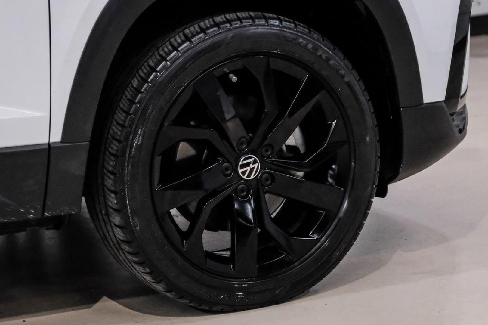 2022 Pure White /Gray/Black Volkswagen Taos 1.5T SEL (3VV1X7B28NM) with an 1.5L I4 Turbocharged DOHC 16V LEV3-SULEV30 158hp engine, Automatic transmission, located at 15300 Midway Rd., Addison, TX, 75001, (972) 702-0011, 32.958321, -96.838074 - Photo#58