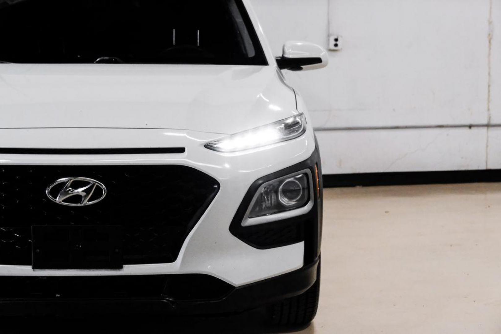 2019 White /Black Hyundai Kona SE (KM8K1CAA4KU) with an I4 engine, Automatic transmission, located at 15300 Midway Rd., Addison, TX, 75001, (972) 702-0011, 32.958321, -96.838074 - Photo#43