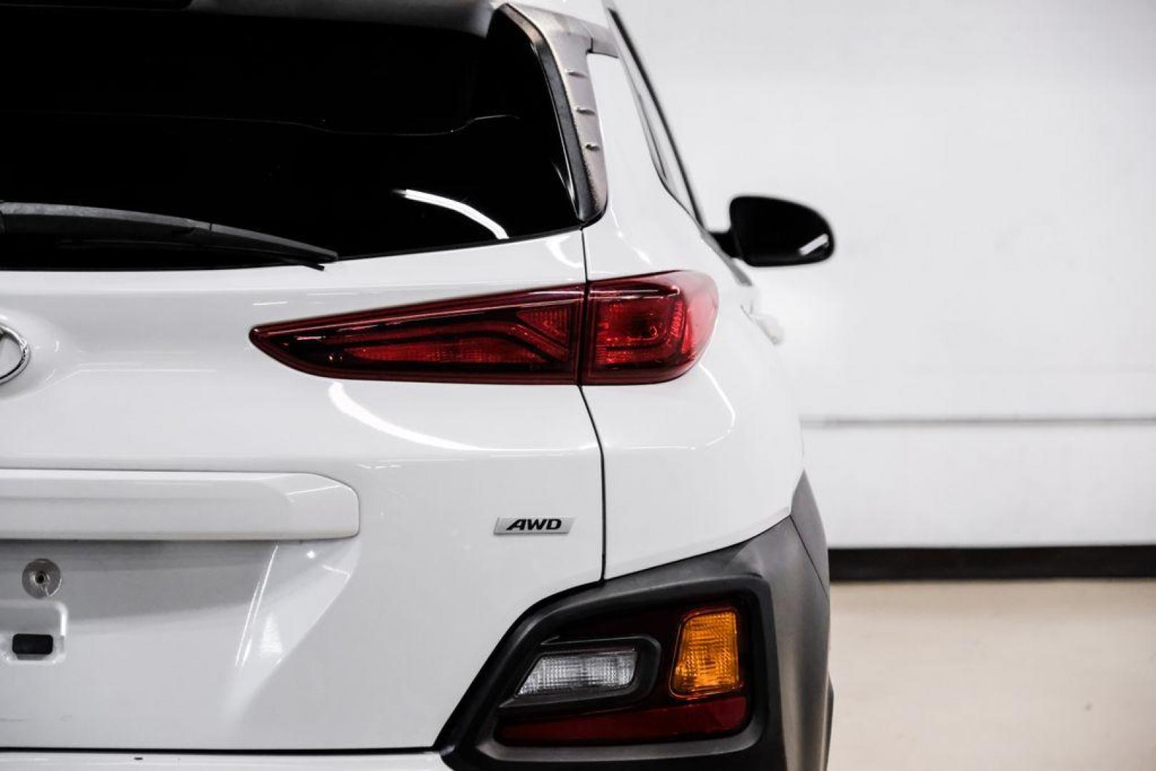 2019 White /Black Hyundai Kona SE (KM8K1CAA4KU) with an I4 engine, Automatic transmission, located at 15300 Midway Rd., Addison, TX, 75001, (972) 702-0011, 32.958321, -96.838074 - Photo#44