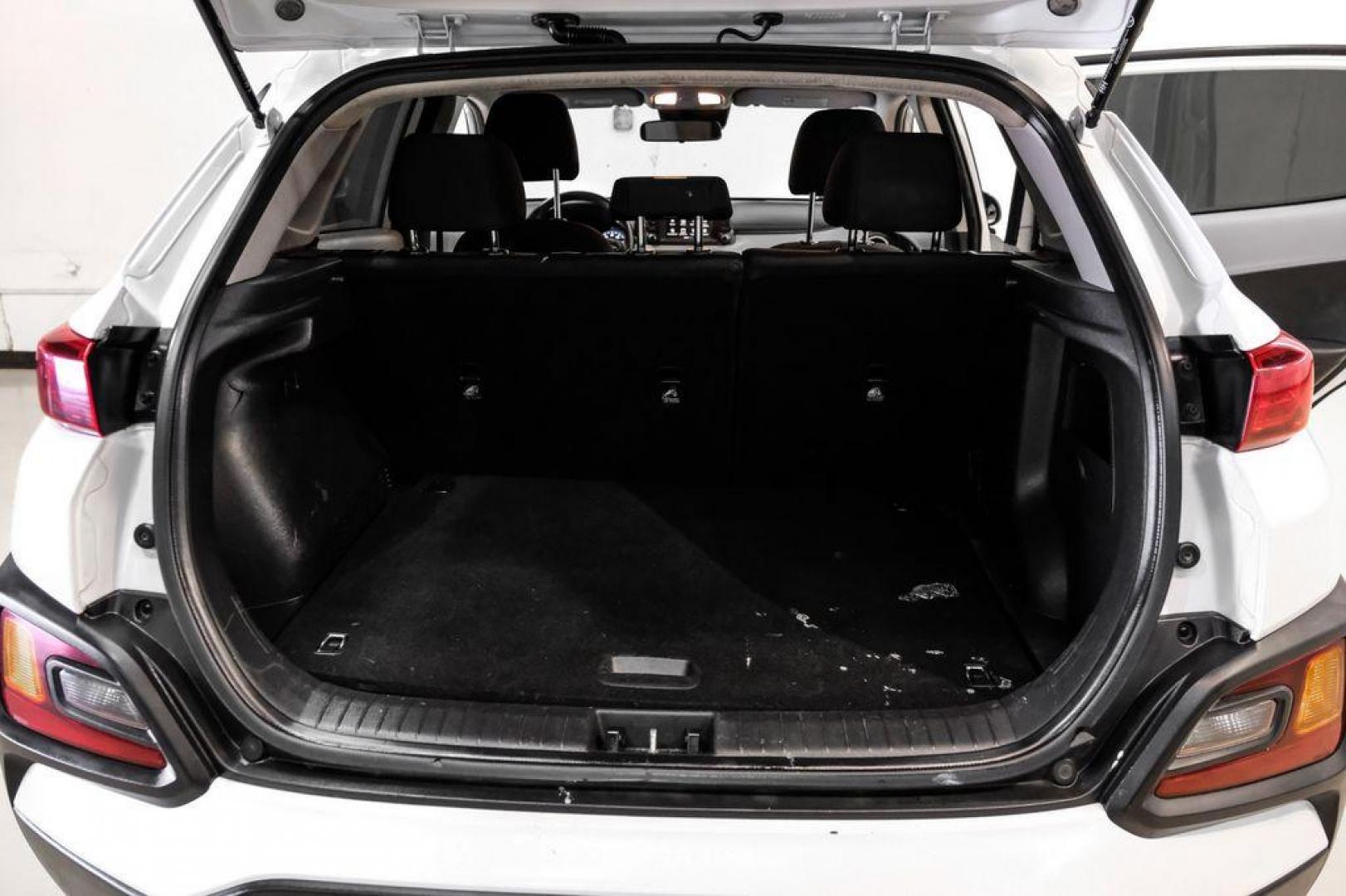 2019 White /Black Hyundai Kona SE (KM8K1CAA4KU) with an I4 engine, Automatic transmission, located at 15300 Midway Rd., Addison, TX, 75001, (972) 702-0011, 32.958321, -96.838074 - Photo#49