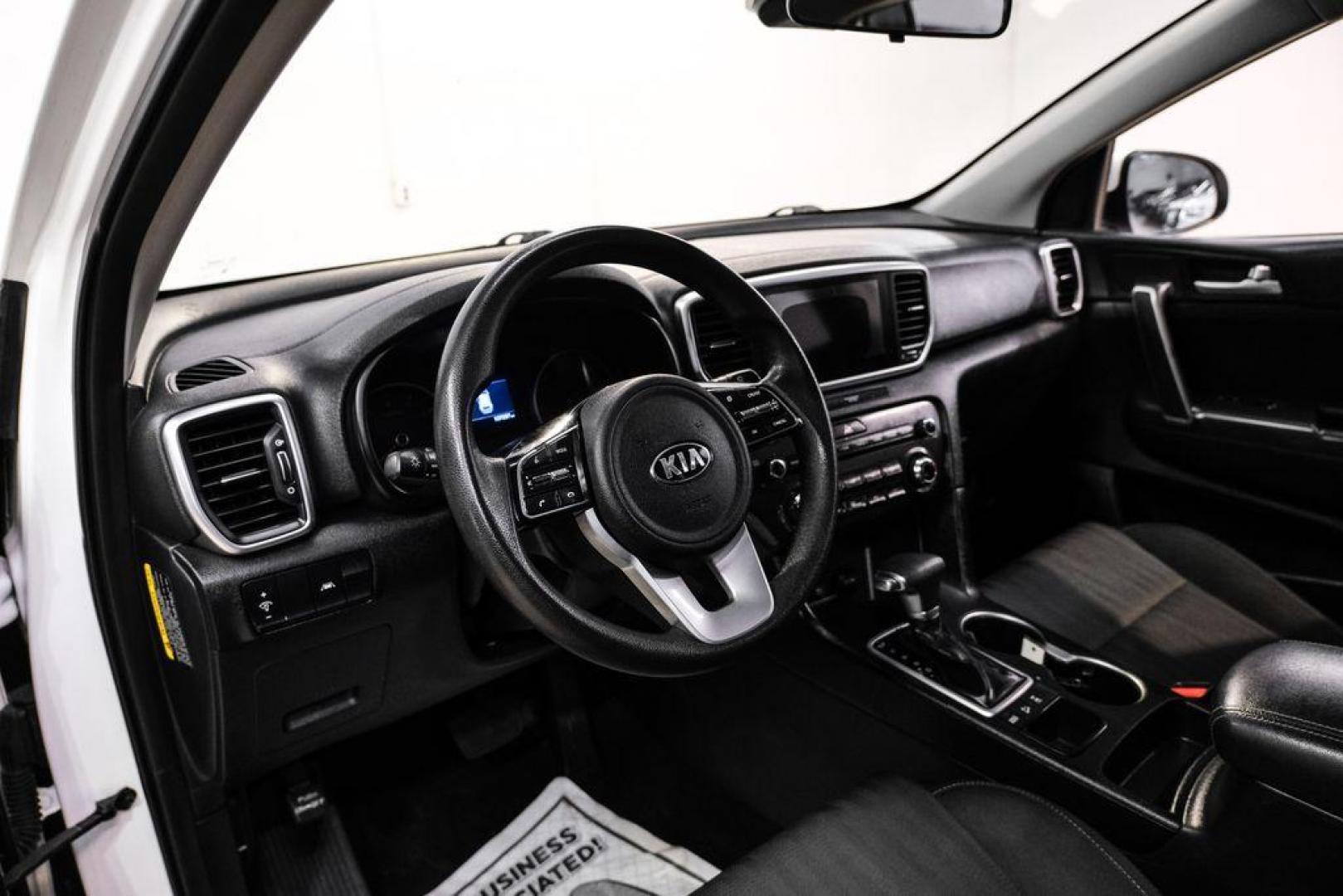 2020 Clear White /Black Kia Sportage LX (KNDPMCAC1L7) with an 2.4L I4 DGI DOHC 16V engine, Automatic transmission, located at 15300 Midway Rd., Addison, TX, 75001, (972) 702-0011, 32.958321, -96.838074 - Photo#2