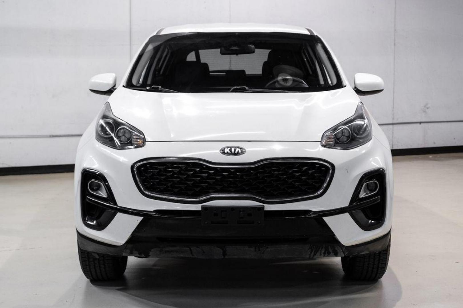2020 Clear White /Black Kia Sportage LX (KNDPMCAC1L7) with an 2.4L I4 DGI DOHC 16V engine, Automatic transmission, located at 15300 Midway Rd., Addison, TX, 75001, (972) 702-0011, 32.958321, -96.838074 - Photo#4