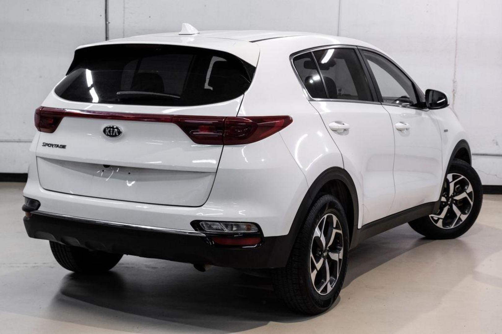 2020 Clear White /Black Kia Sportage LX (KNDPMCAC1L7) with an 2.4L I4 DGI DOHC 16V engine, Automatic transmission, located at 15300 Midway Rd., Addison, TX, 75001, (972) 702-0011, 32.958321, -96.838074 - Photo#7