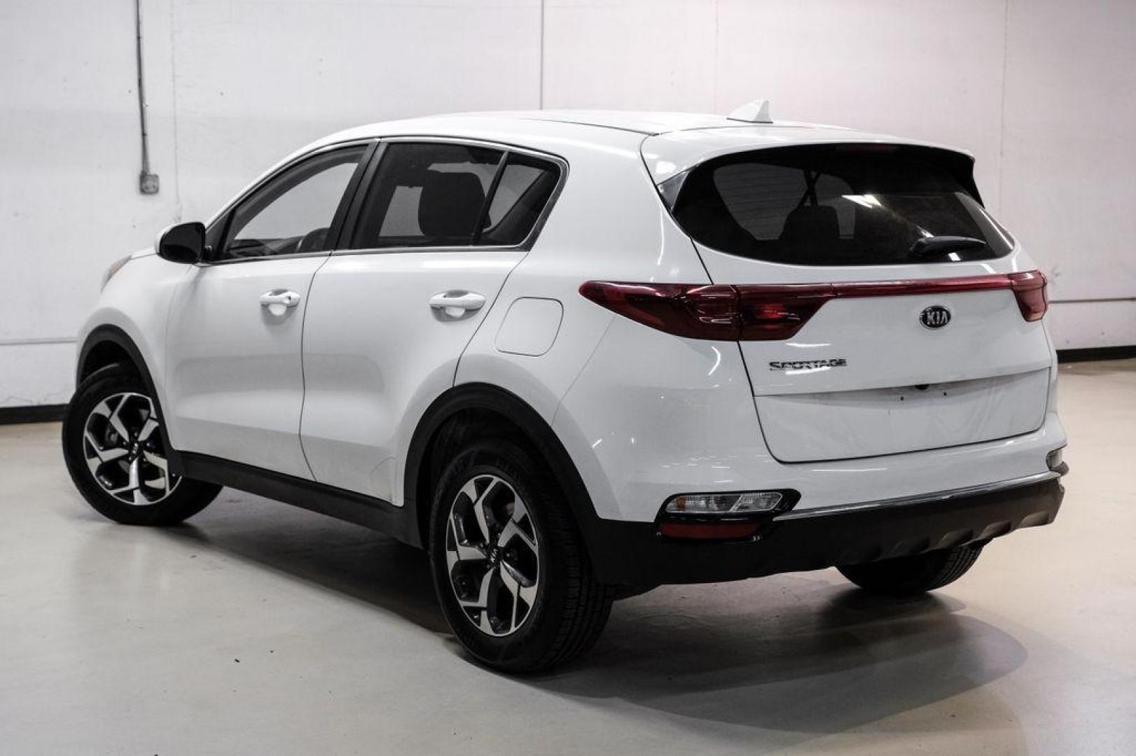 2020 Clear White /Black Kia Sportage LX (KNDPMCAC1L7) with an 2.4L I4 DGI DOHC 16V engine, Automatic transmission, located at 15300 Midway Rd., Addison, TX, 75001, (972) 702-0011, 32.958321, -96.838074 - Photo#9