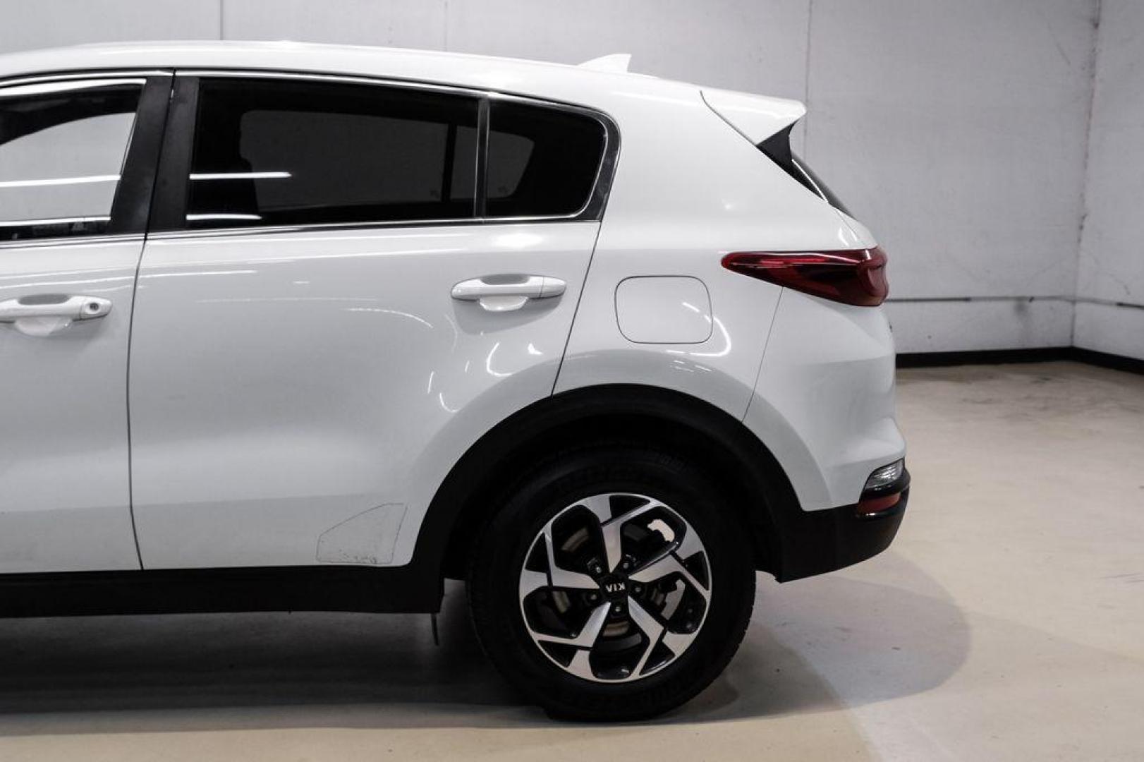 2020 Clear White /Black Kia Sportage LX (KNDPMCAC1L7) with an 2.4L I4 DGI DOHC 16V engine, Automatic transmission, located at 15300 Midway Rd., Addison, TX, 75001, (972) 702-0011, 32.958321, -96.838074 - Photo#12