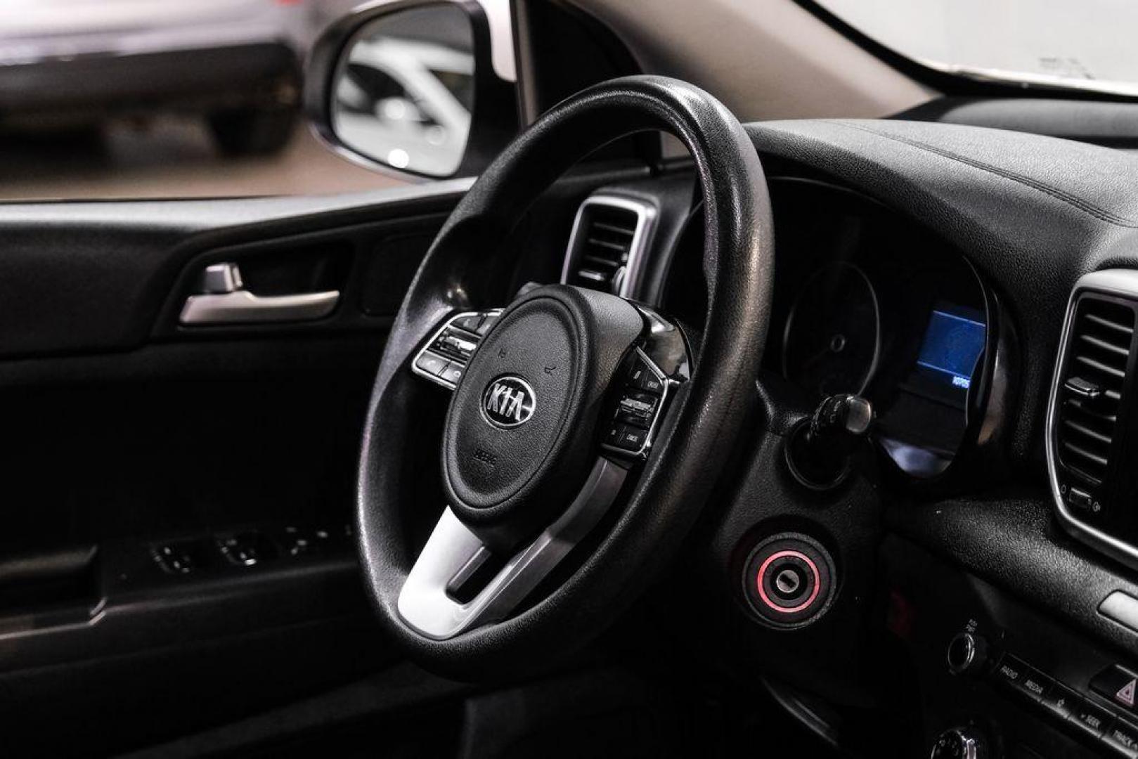 2020 Clear White /Black Kia Sportage LX (KNDPMCAC1L7) with an 2.4L I4 DGI DOHC 16V engine, Automatic transmission, located at 15300 Midway Rd., Addison, TX, 75001, (972) 702-0011, 32.958321, -96.838074 - Photo#15