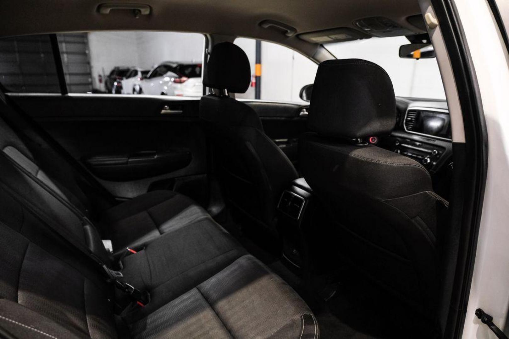 2020 Clear White /Black Kia Sportage LX (KNDPMCAC1L7) with an 2.4L I4 DGI DOHC 16V engine, Automatic transmission, located at 15300 Midway Rd., Addison, TX, 75001, (972) 702-0011, 32.958321, -96.838074 - Photo#36