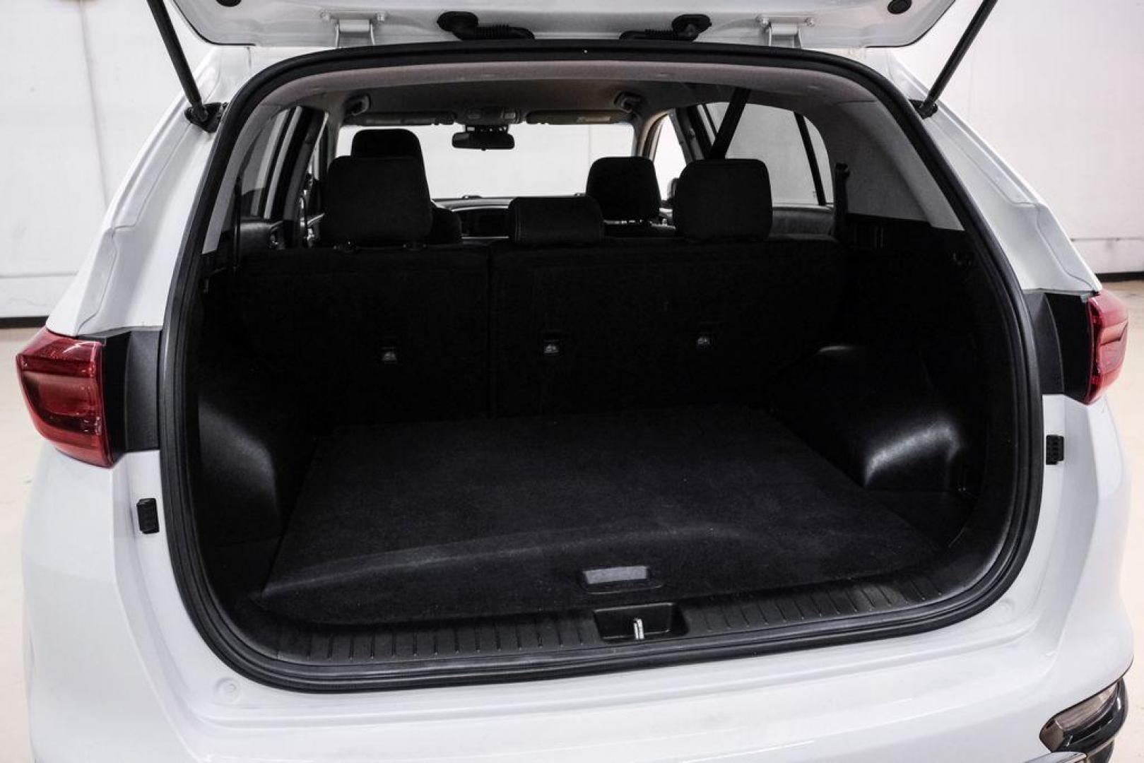 2020 Clear White /Black Kia Sportage LX (KNDPMCAC1L7) with an 2.4L I4 DGI DOHC 16V engine, Automatic transmission, located at 15300 Midway Rd., Addison, TX, 75001, (972) 702-0011, 32.958321, -96.838074 - Photo#52