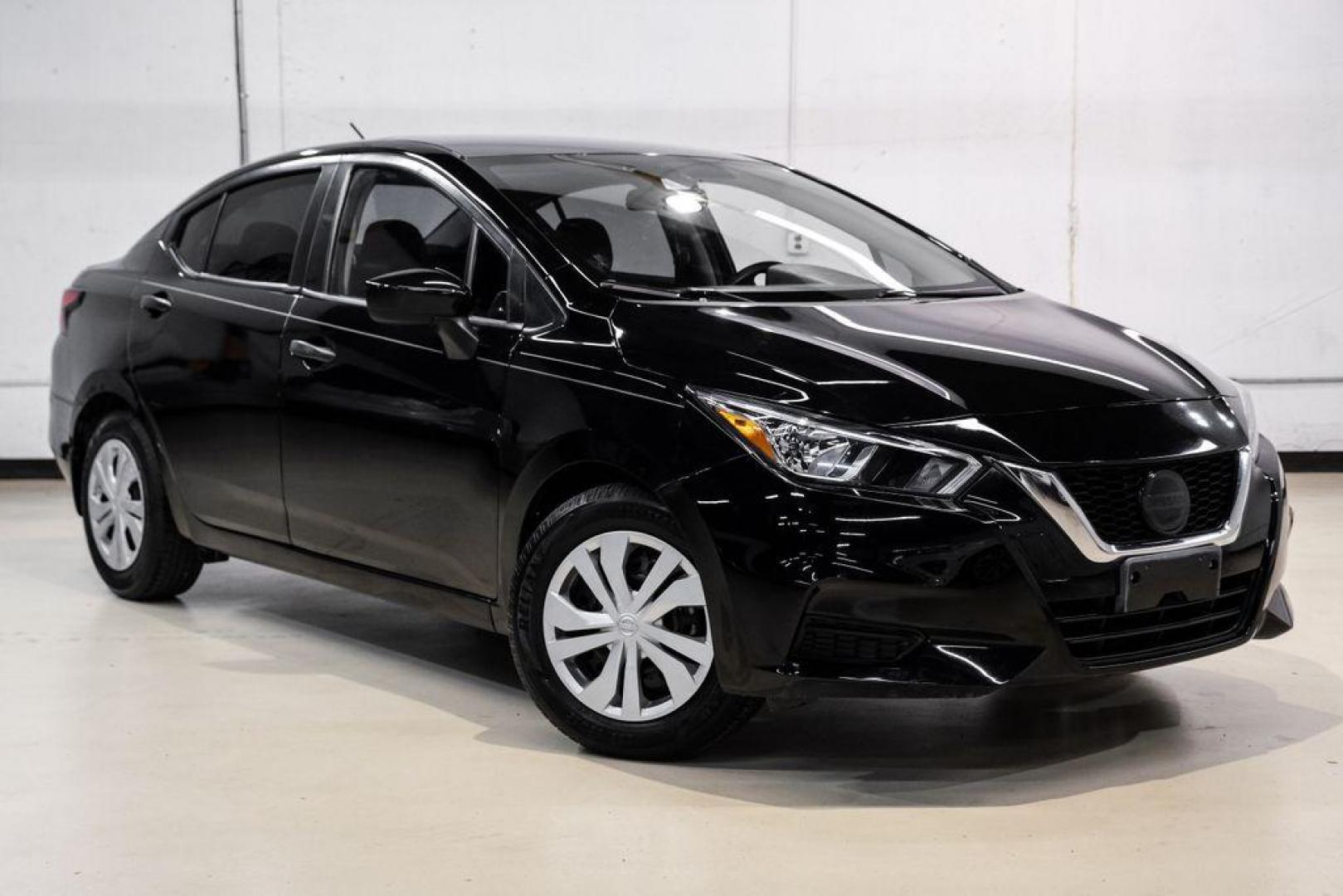 2021 Super Black Metallic /Charcoal Nissan Versa 1.6 S (3N1CN8DV2ML) with an 1.6L 4-Cylinder DOHC 16V engine, CVT transmission, located at 15300 Midway Rd., Addison, TX, 75001, (972) 702-0011, 32.958321, -96.838074 - Photo#5