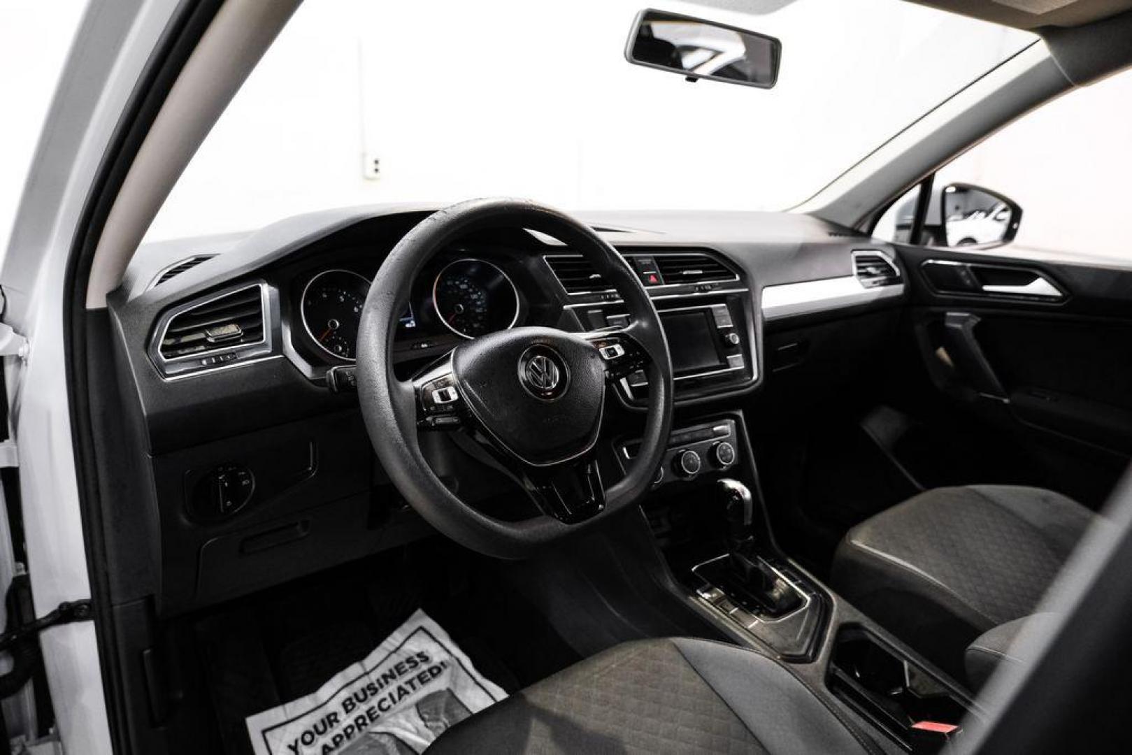 2018 White Silver /Titan Black Volkswagen Tiguan 2.0T S (3VV1B7AX8JM) with an 2.0L TSI DOHC engine, Automatic transmission, located at 15300 Midway Rd., Addison, TX, 75001, (972) 702-0011, 32.958321, -96.838074 - Photo#2