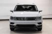 2018 White Silver /Titan Black Volkswagen Tiguan 2.0T S (3VV1B7AX8JM) with an 2.0L TSI DOHC engine, Automatic transmission, located at 15300 Midway Rd., Addison, TX, 75001, (972) 702-0011, 32.958321, -96.838074 - Photo#4