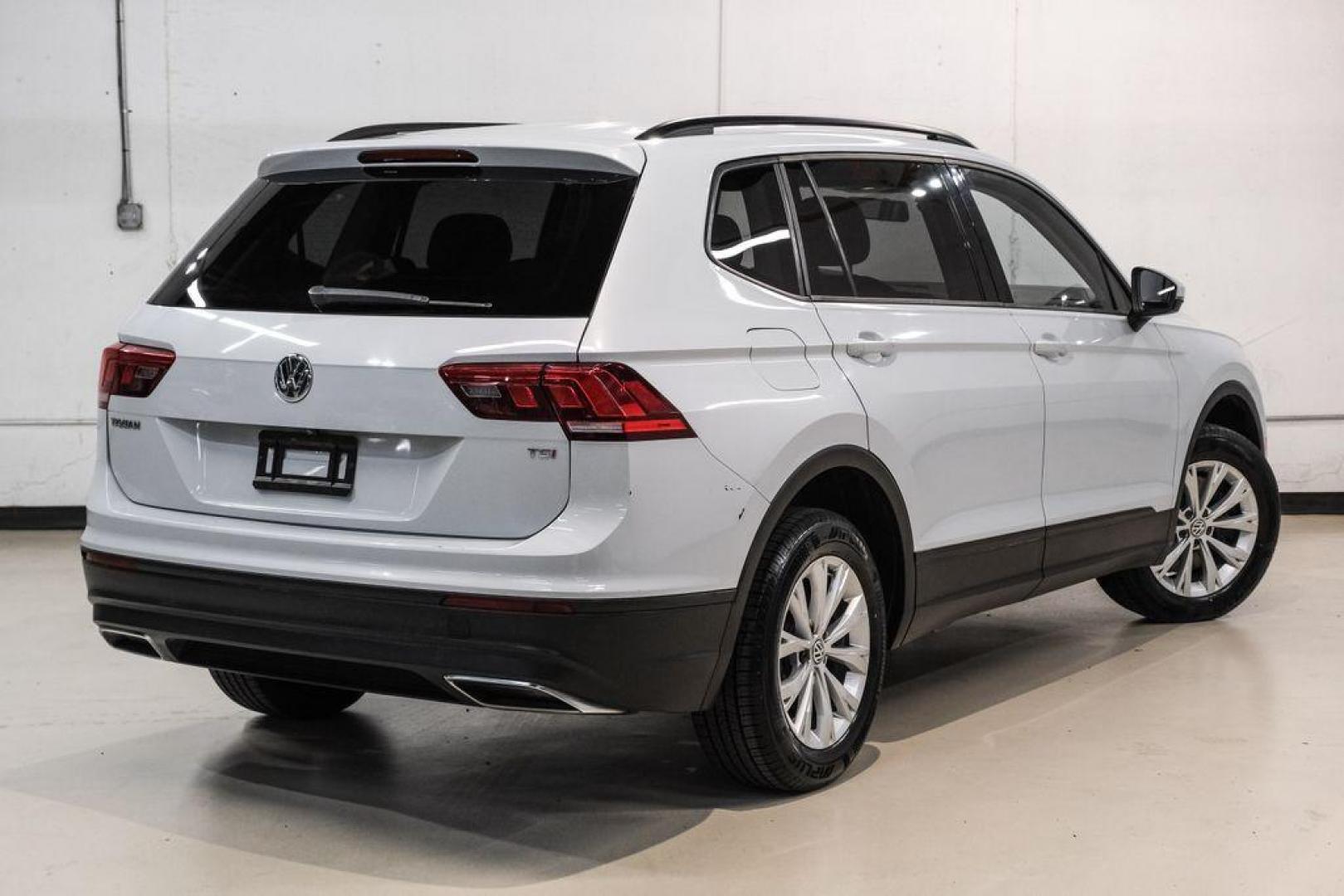 2018 White Silver /Titan Black Volkswagen Tiguan 2.0T S (3VV1B7AX8JM) with an 2.0L TSI DOHC engine, Automatic transmission, located at 15300 Midway Rd., Addison, TX, 75001, (972) 702-0011, 32.958321, -96.838074 - Photo#7