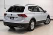 2018 White Silver /Titan Black Volkswagen Tiguan 2.0T S (3VV1B7AX8JM) with an 2.0L TSI DOHC engine, Automatic transmission, located at 15300 Midway Rd., Addison, TX, 75001, (972) 702-0011, 32.958321, -96.838074 - Photo#7
