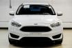 2017 Oxford White /Black Ford Focus SE (1FADP3F23HL) with an 2.0L 4-Cylinder DGI Flex Fuel Turbocharged DOHC engine, Automatic transmission, located at 15300 Midway Rd., Addison, TX, 75001, (972) 702-0011, 32.958321, -96.838074 - Photo#3