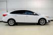 2017 Oxford White /Black Ford Focus SE (1FADP3F23HL) with an 2.0L 4-Cylinder DGI Flex Fuel Turbocharged DOHC engine, Automatic transmission, located at 15300 Midway Rd., Addison, TX, 75001, (972) 702-0011, 32.958321, -96.838074 - Photo#4