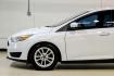 2017 Oxford White /Black Ford Focus SE (1FADP3F23HL) with an 2.0L 4-Cylinder DGI Flex Fuel Turbocharged DOHC engine, Automatic transmission, located at 15300 Midway Rd., Addison, TX, 75001, (972) 702-0011, 32.958321, -96.838074 - Photo#9