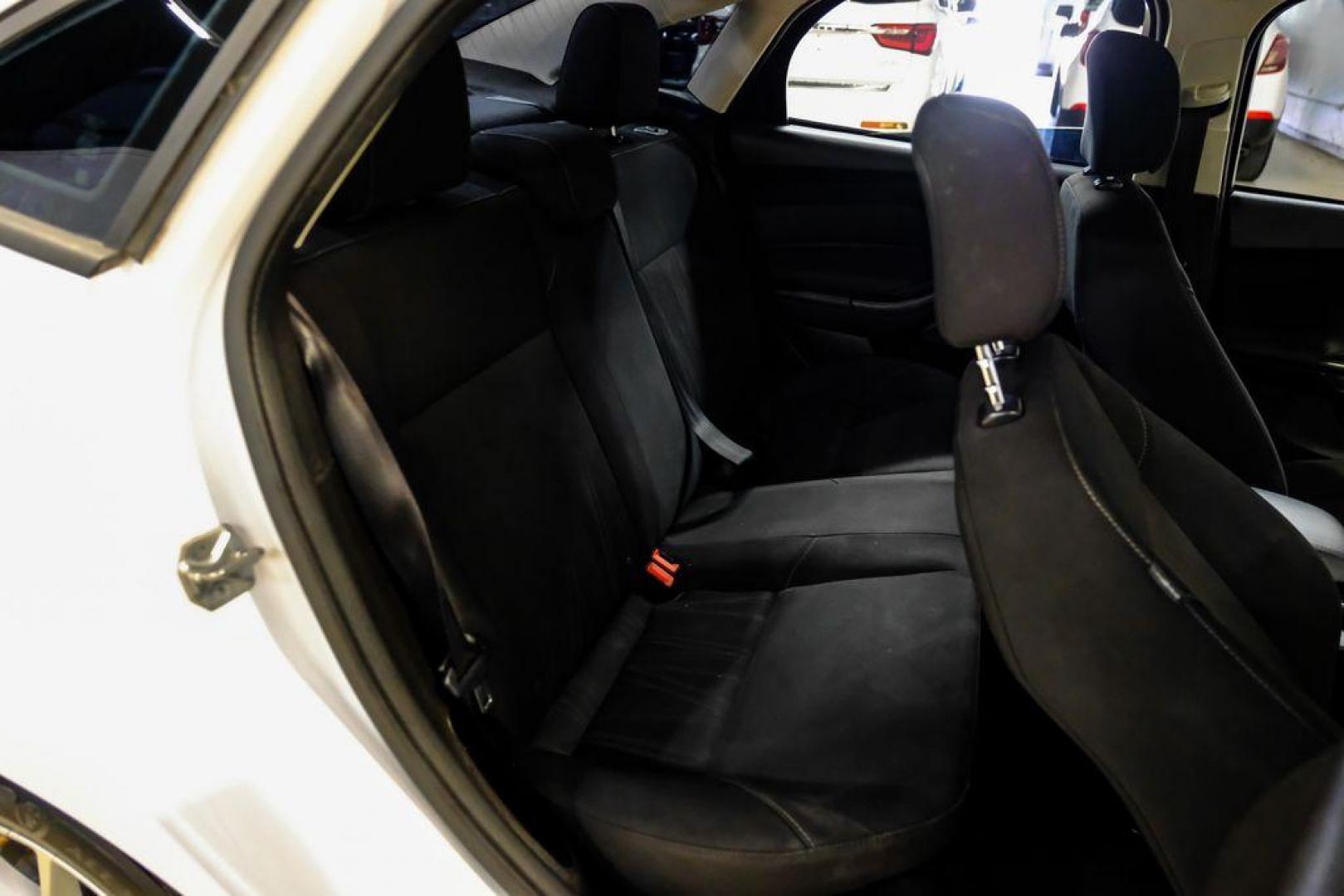 2017 Oxford White /Black Ford Focus SE (1FADP3F23HL) with an 2.0L 4-Cylinder DGI Flex Fuel Turbocharged DOHC engine, Automatic transmission, located at 15300 Midway Rd., Addison, TX, 75001, (972) 702-0011, 32.958321, -96.838074 - Photo#31