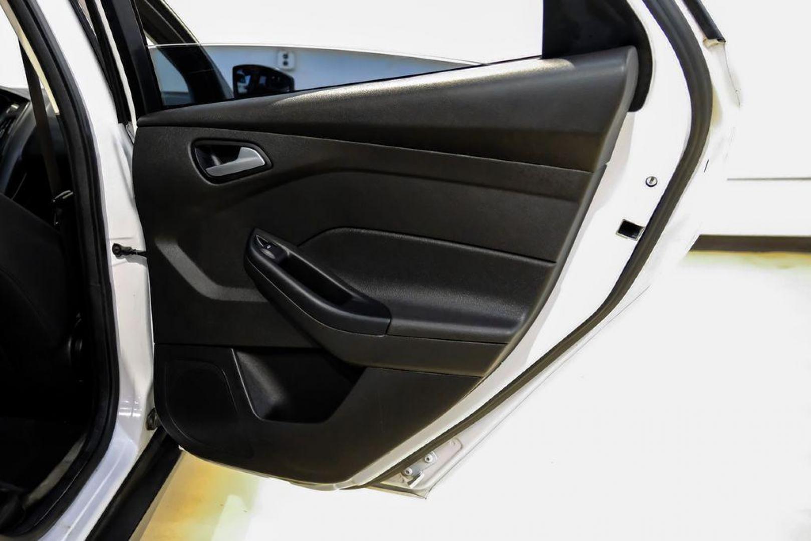 2017 Oxford White /Black Ford Focus SE (1FADP3F23HL) with an 2.0L 4-Cylinder DGI Flex Fuel Turbocharged DOHC engine, Automatic transmission, located at 15300 Midway Rd., Addison, TX, 75001, (972) 702-0011, 32.958321, -96.838074 - Photo#42