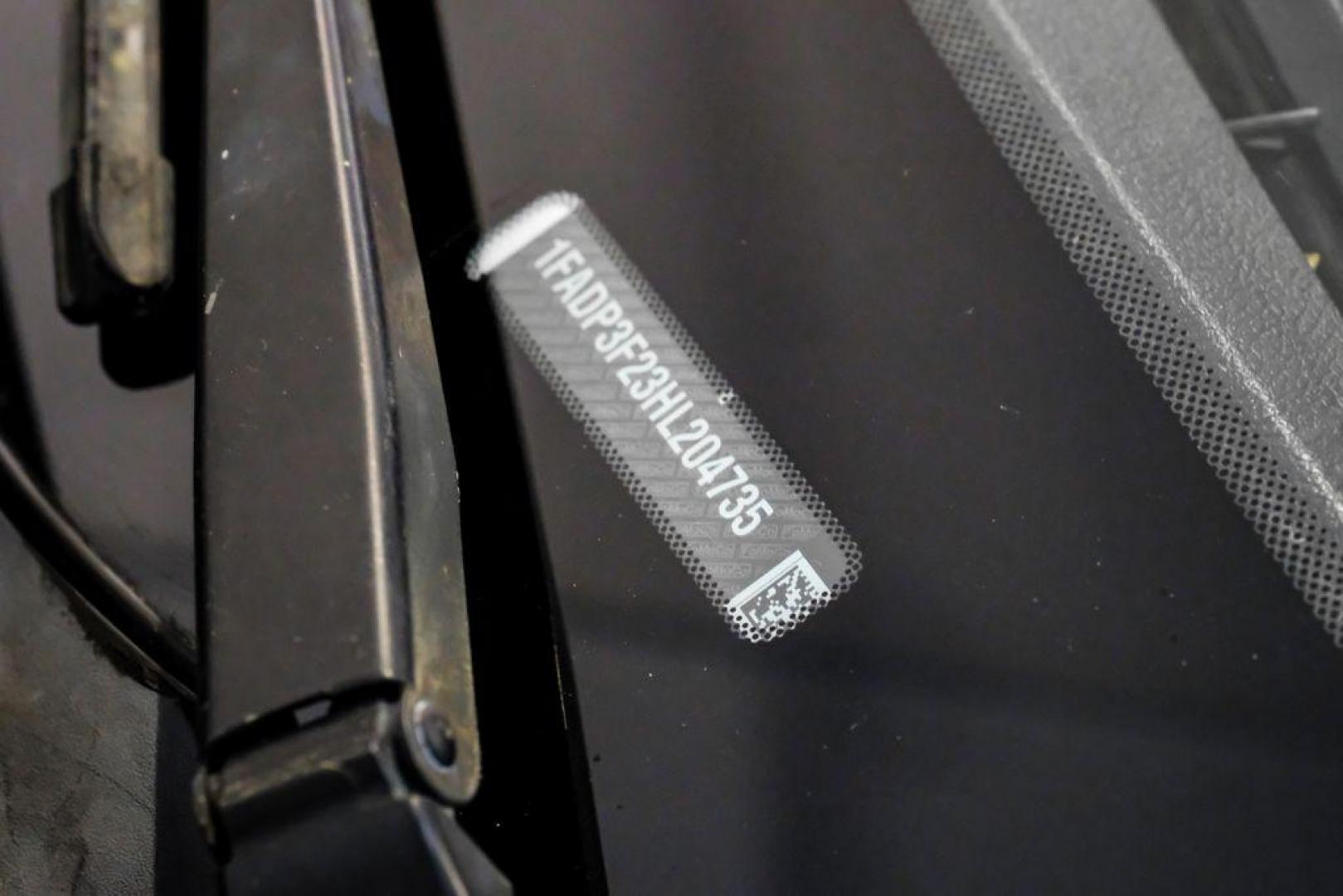 2017 Oxford White /Black Ford Focus SE (1FADP3F23HL) with an 2.0L 4-Cylinder DGI Flex Fuel Turbocharged DOHC engine, Automatic transmission, located at 15300 Midway Rd., Addison, TX, 75001, (972) 702-0011, 32.958321, -96.838074 - Photo#54