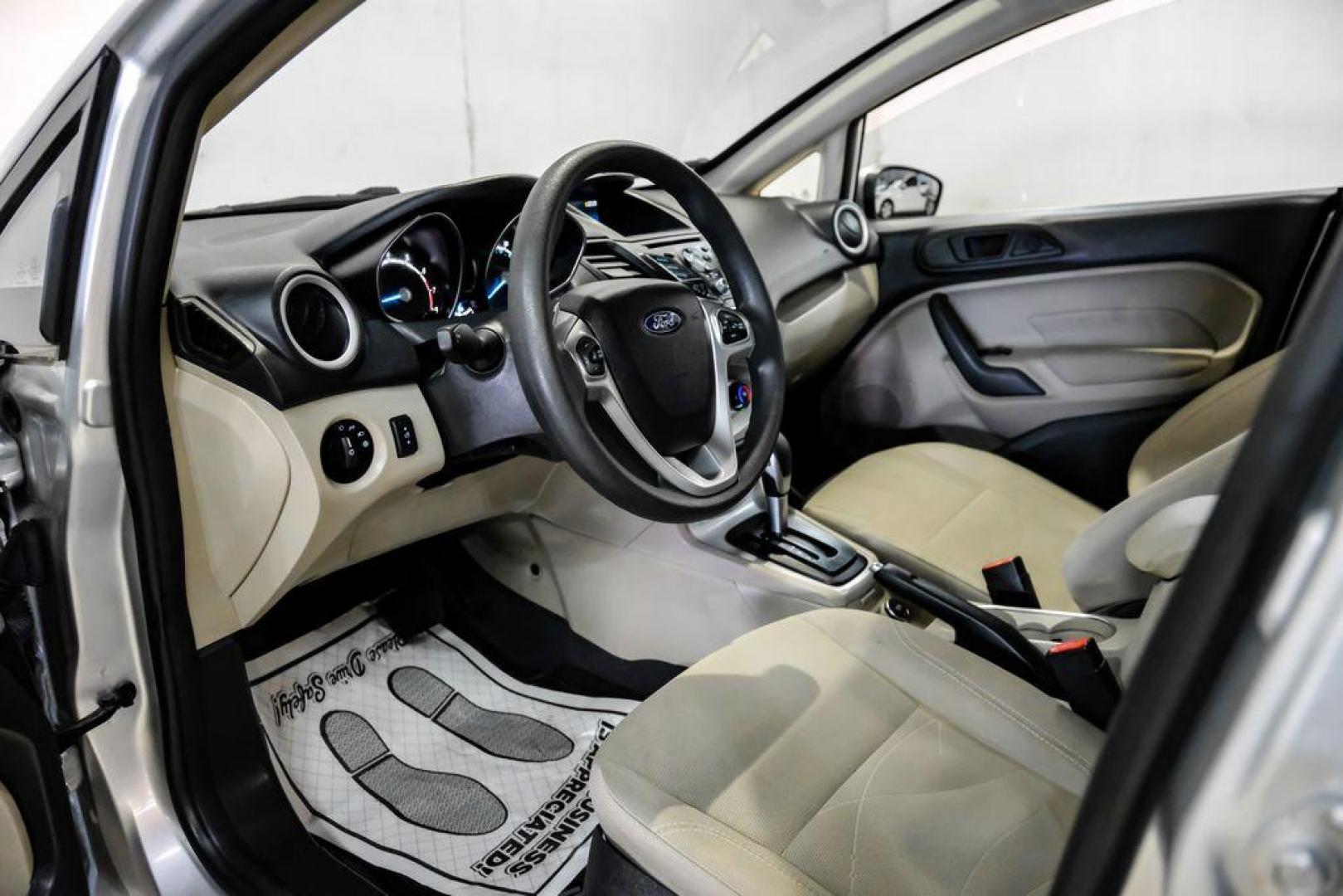 2019 Ingot Silver /Medium Light Stone Ford Fiesta SE (3FADP4EJ1KM) with an 1.6L I4 Ti-VCT engine, Automatic transmission, located at 15300 Midway Rd., Addison, TX, 75001, (972) 702-0011, 32.958321, -96.838074 - Photo#2