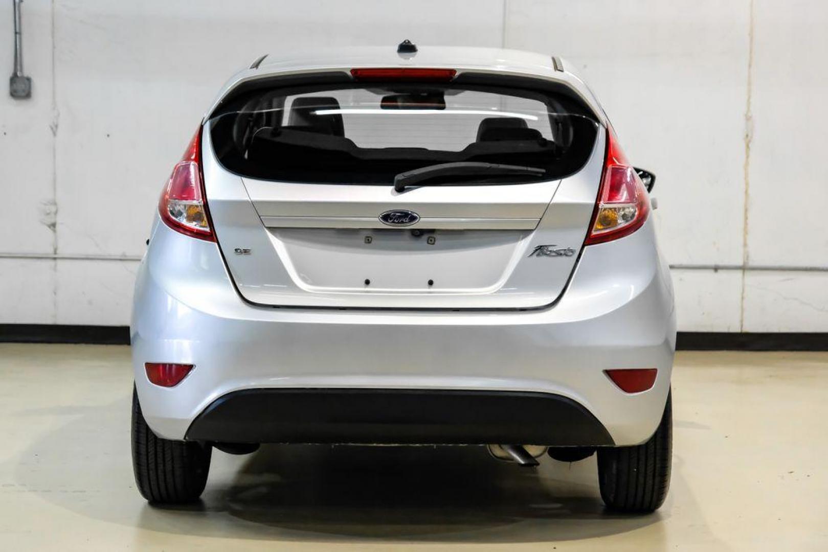 2019 Ingot Silver /Medium Light Stone Ford Fiesta SE (3FADP4EJ1KM) with an 1.6L I4 Ti-VCT engine, Automatic transmission, located at 15300 Midway Rd., Addison, TX, 75001, (972) 702-0011, 32.958321, -96.838074 - Photo#7