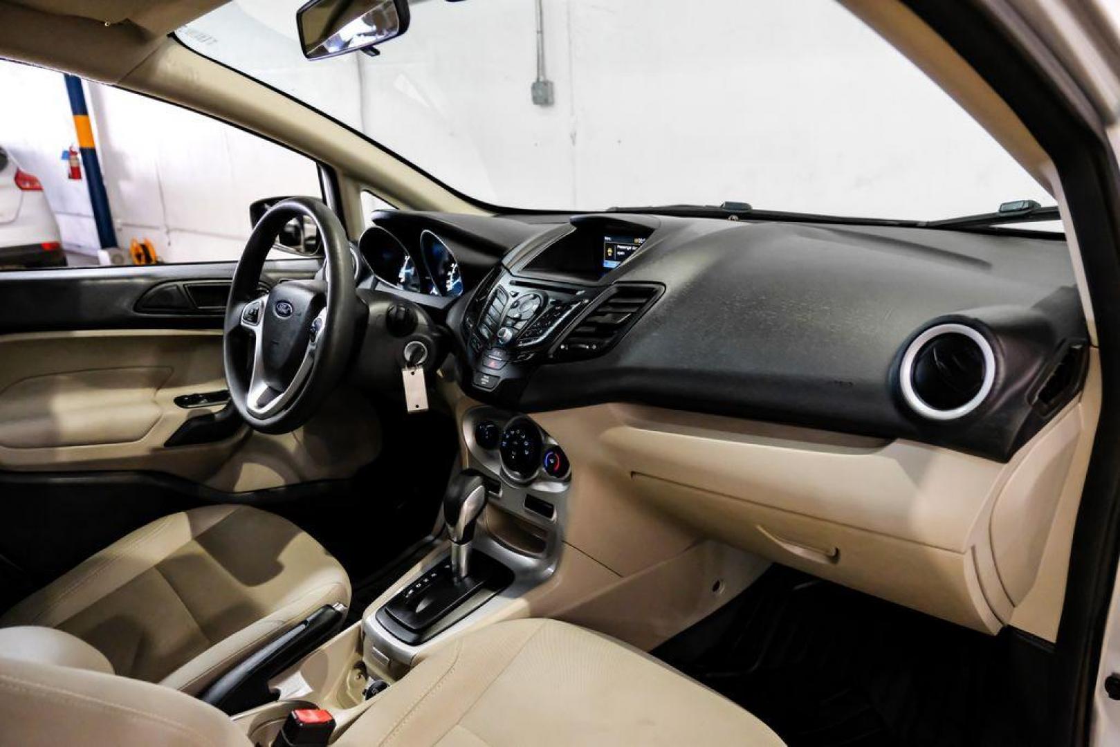 2019 Ingot Silver /Medium Light Stone Ford Fiesta SE (3FADP4EJ1KM) with an 1.6L I4 Ti-VCT engine, Automatic transmission, located at 15300 Midway Rd., Addison, TX, 75001, (972) 702-0011, 32.958321, -96.838074 - Photo#12