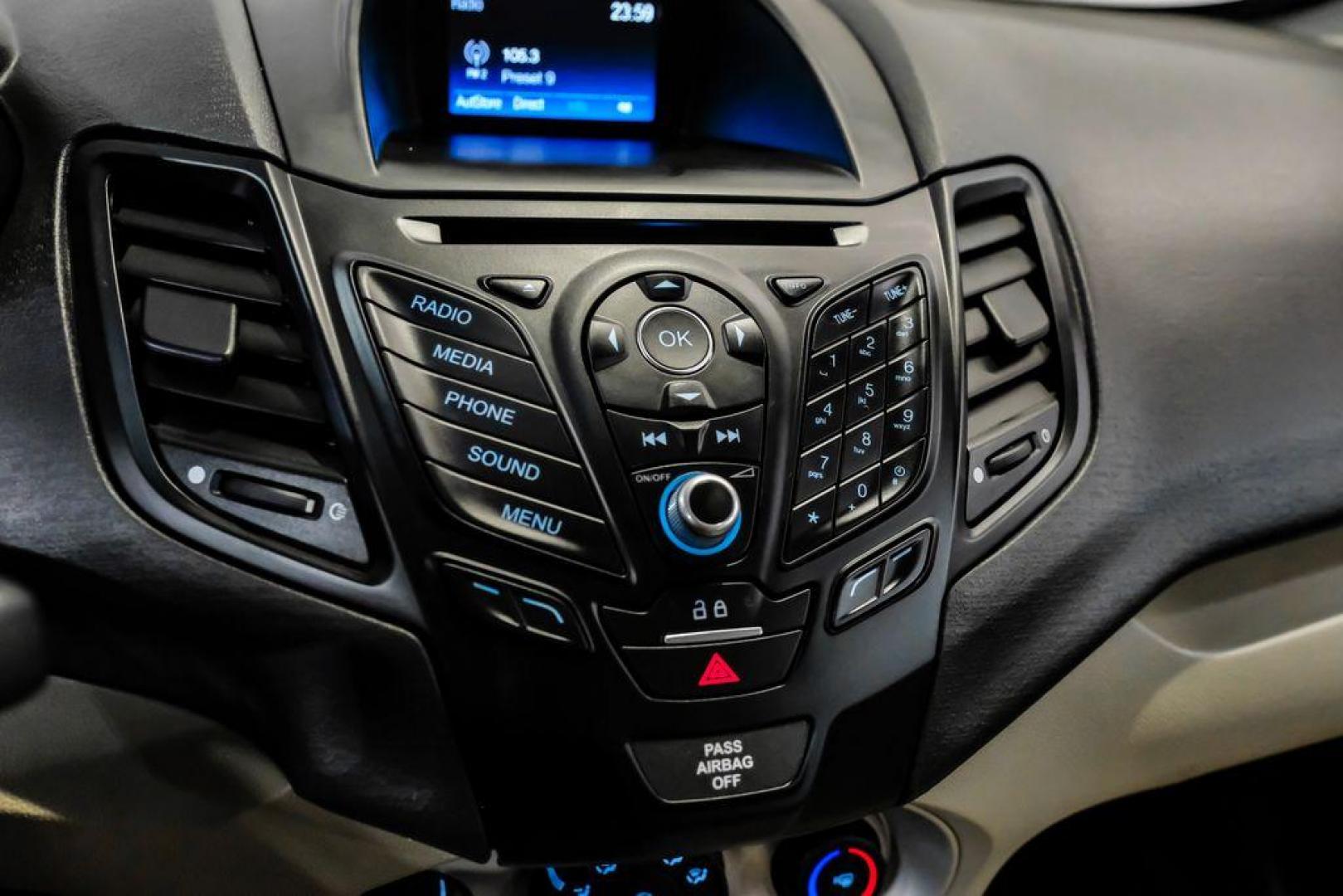 2019 Ingot Silver /Medium Light Stone Ford Fiesta SE (3FADP4EJ1KM) with an 1.6L I4 Ti-VCT engine, Automatic transmission, located at 15300 Midway Rd., Addison, TX, 75001, (972) 702-0011, 32.958321, -96.838074 - Photo#22