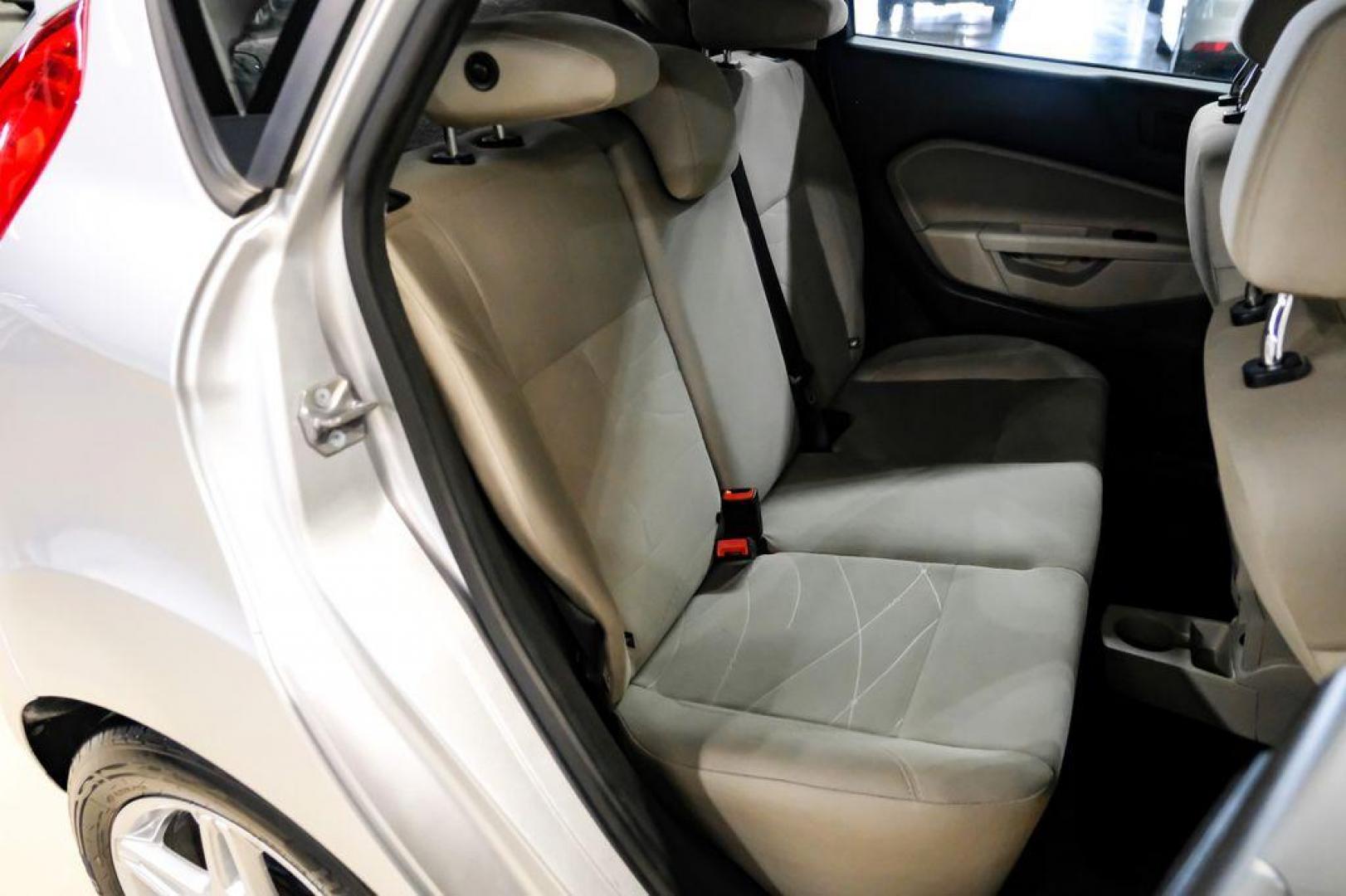 2019 Ingot Silver /Medium Light Stone Ford Fiesta SE (3FADP4EJ1KM) with an 1.6L I4 Ti-VCT engine, Automatic transmission, located at 15300 Midway Rd., Addison, TX, 75001, (972) 702-0011, 32.958321, -96.838074 - Photo#31