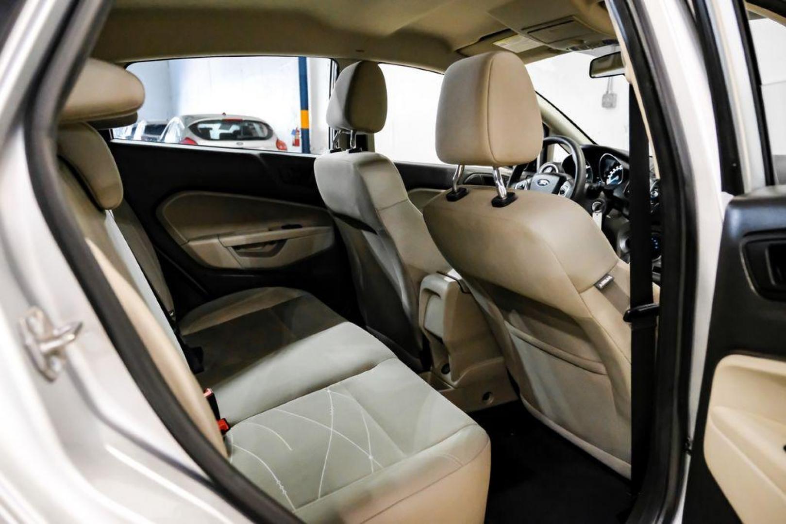 2019 Ingot Silver /Medium Light Stone Ford Fiesta SE (3FADP4EJ1KM) with an 1.6L I4 Ti-VCT engine, Automatic transmission, located at 15300 Midway Rd., Addison, TX, 75001, (972) 702-0011, 32.958321, -96.838074 - Photo#32